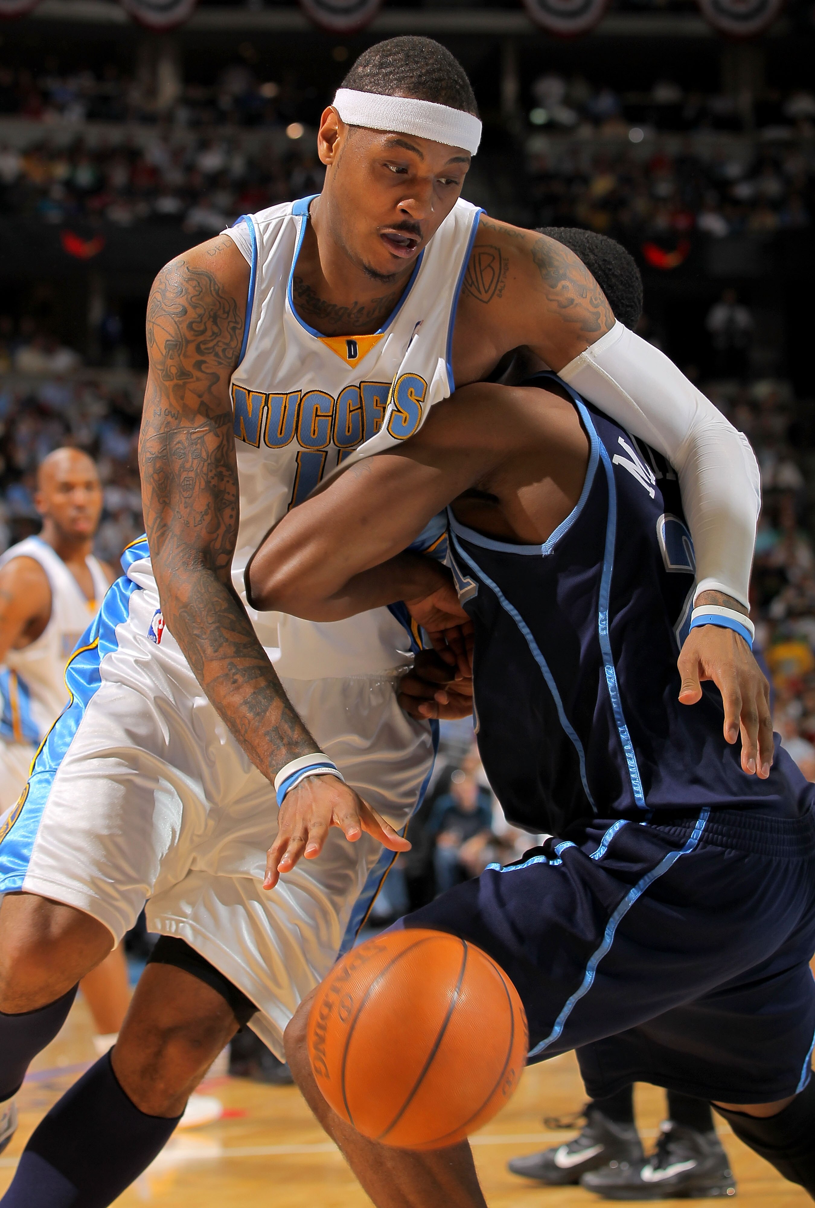 DENVER - APRIL 28:  Carmelo Anthony #15 of the Denver Nuggets tries to drive around Wesley Matthews #23 of the Utah Jazz in Game Five of the Western Conference Quarterfinals of the 2010 NBA Playoffs at the Pepsi Center on April 28, 2010 in Denver, Colorad