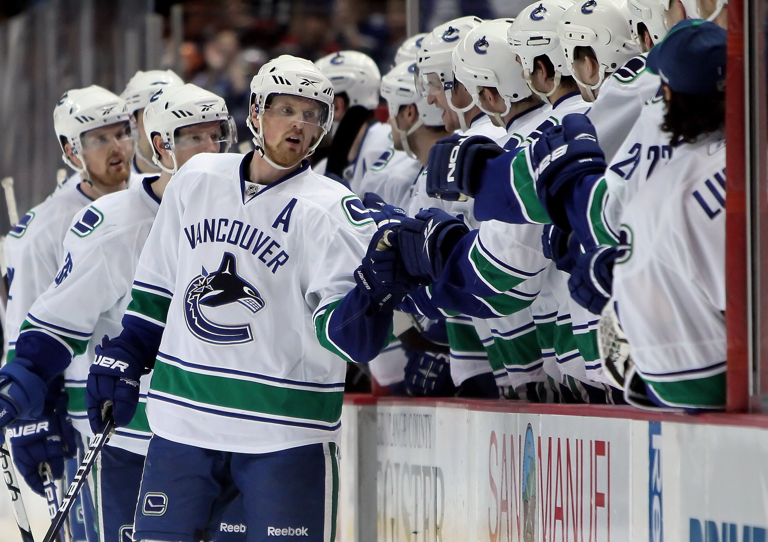 ANAHEIM, CA - APRIL 02: Henrik Sedin #33 of the Vancouver Canucks receives high fives from the bench during the game against the Anaheim Ducks at the Honda Center on April 2, 2010 in Anaheim, California. (Photo by Jeff Gross/Getty Images) ANAHEIM, CA - APRIL 02: Henrik Sedin #33 of the Vancouver Canucks receives high fives from the bench during the game against the Anaheim Ducks at the Honda Center on April 2, 2010 in Anaheim, California. (Photo by Jeff Gross/Getty Images)