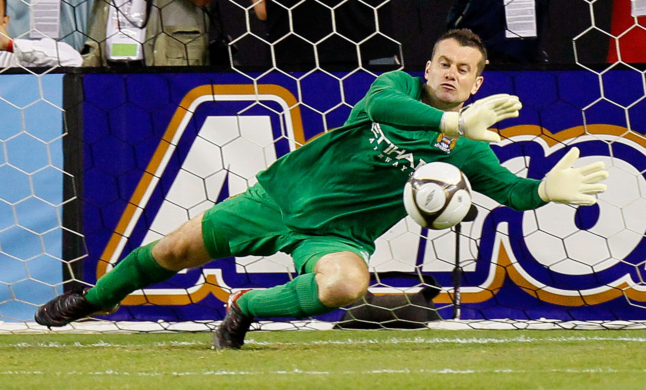 ATLANTA - JULY 28:  Goalkeeper Shay Given #1 of Manchester City saves a penalty kick by Daniel Montenegro (not pictured) #10 of Club America during the 2010 Aaron's International Soccer Challenge match at Georgia Dome on July 28, 2010 in Atlanta, Georgia.