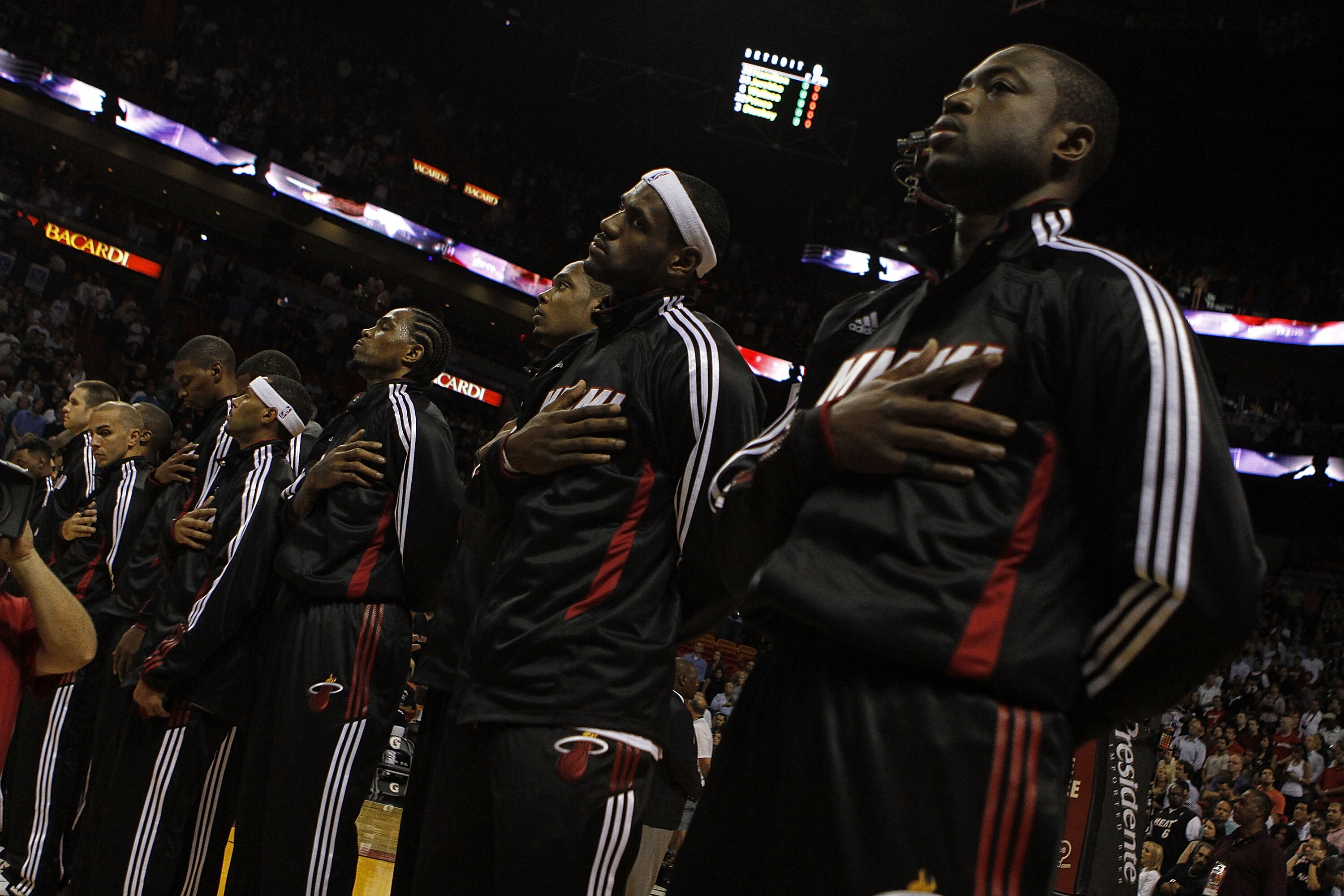 MIAMI - OCTOBER 05:  Forward LeBron James #6 (C) and teammate Dwyane Wade #3 (R) on the court before taking on the Detroit Pistons on October 5, 2010 in Miami, Florida.  NOTE TO USER: User expressly acknowledges and agrees that, by downloading and or usin