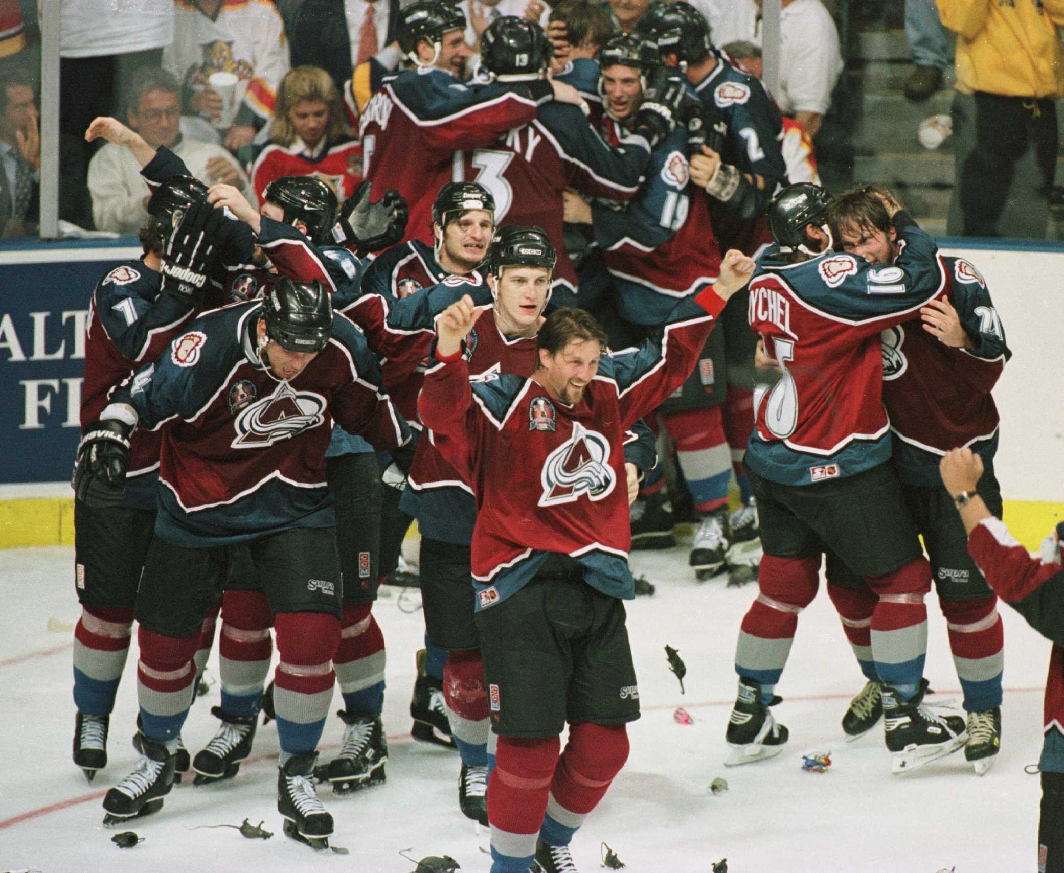 11 Jun 1996: The Colorado Avalanche celebrate after winning the Stanley Cup by defeating the Florida Panthers 1-0 in triple overtime of game four of the Stanley Cup Finals at Miami Arena in Miami, Florida. The Avalanche swept the series by four games to n