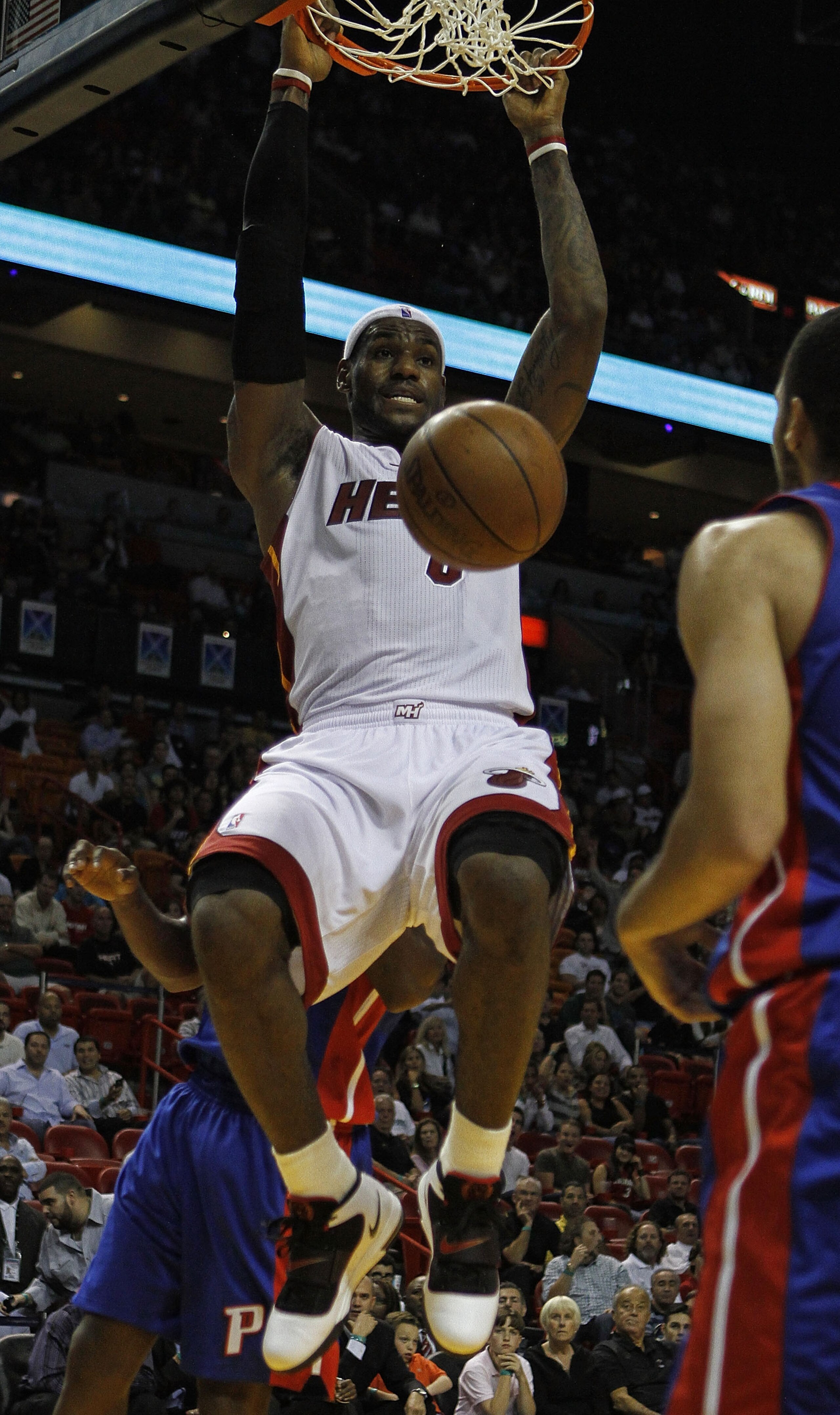 MIAMI - OCTOBER 05:  Forward LeBron James #6 of the Miami Heat dunks against  the Detroit Pistons on October 5, 2010 in Miami, Florida.  NOTE TO USER: User expressly acknowledges and agrees that, by downloading and or using this photograph, User is consen
