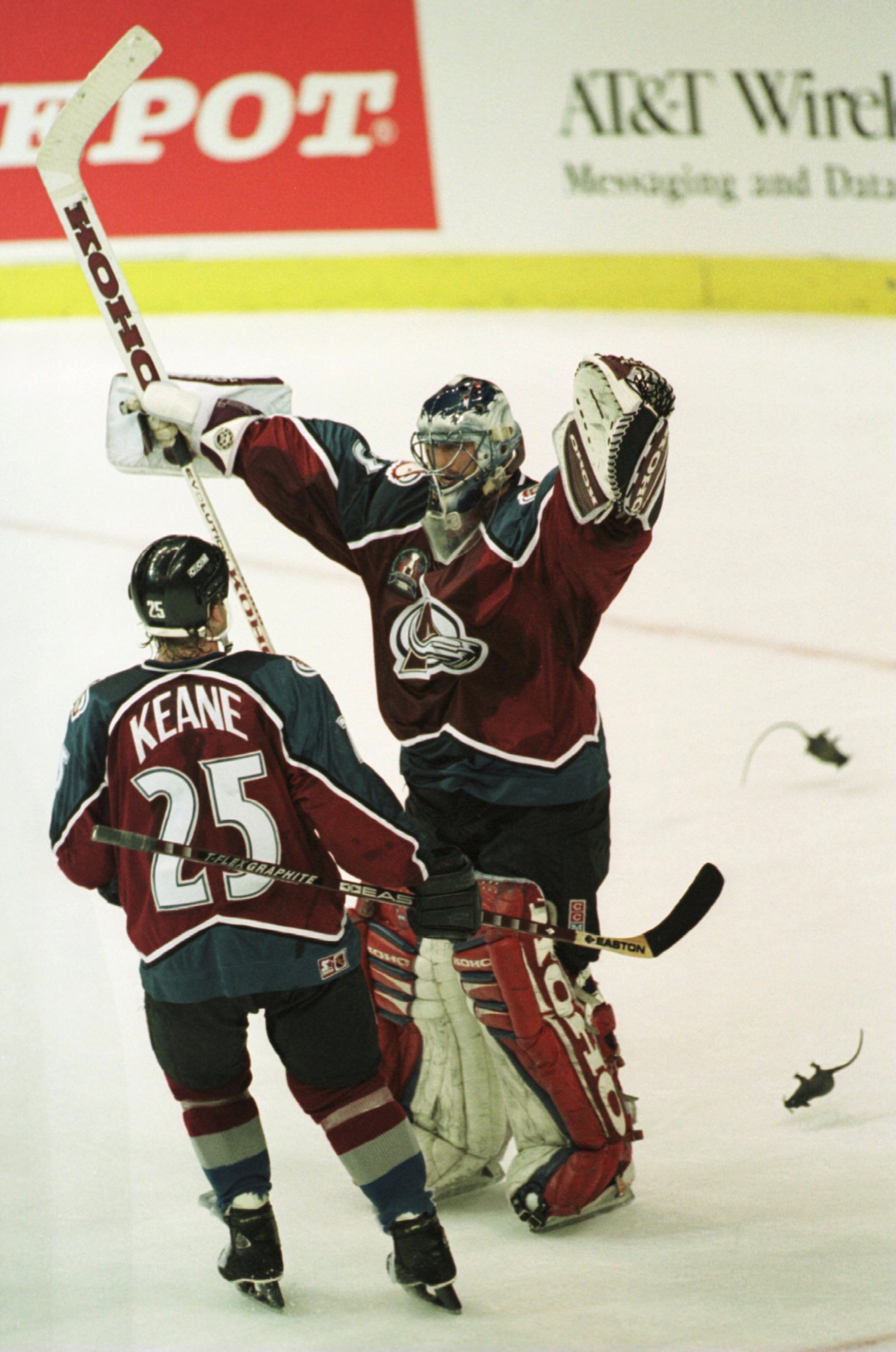 8 Jun 1996: Mike Keane #25 and Patrick Roy #33 of Colorado are pelted with rubber rats as they celebrate their win over Florida in game three of the Stanley Cup Finals at Miami Arena in Miami, Florida. Colorado defeated Florida, 3-2. Mandatory Credit: Gle 8 Jun 1996: Mike Keane #25 and Patrick Roy #33 of Colorado are pelted with rubber rats as they celebrate their win over Florida in game three of the Stanley Cup Finals at Miami Arena in Miami, Florida. Colorado defeated Florida, 3-2. Mandatory Credit: Gle