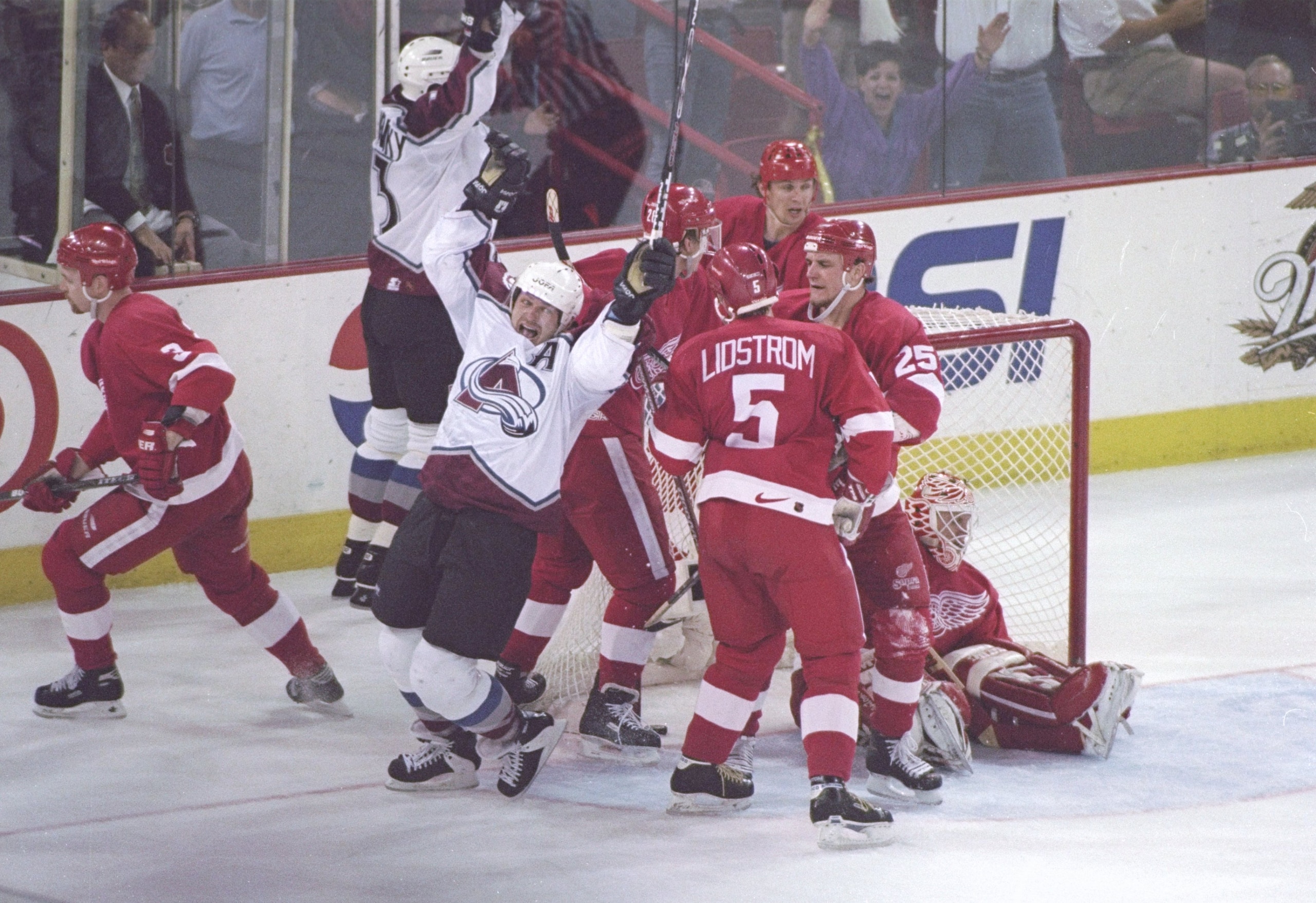 17 May 1997: Right wing Claude Lemieux, left wing Waleri Kamensky of the Colorado Avalanche celebrate during a playoff game against the Detroit Red wings at the McNichols Arena in Denver, Colorado. The Red wings won the game 4-2. Mandatory Credit: Jed J 17 May 1997: Right wing Claude Lemieux, left wing Waleri Kamensky of the Colorado Avalanche celebrate during a playoff game against the Detroit Red wings at the McNichols Arena in Denver, Colorado. The Red wings won the game 4-2. Mandatory Credit: Jed J