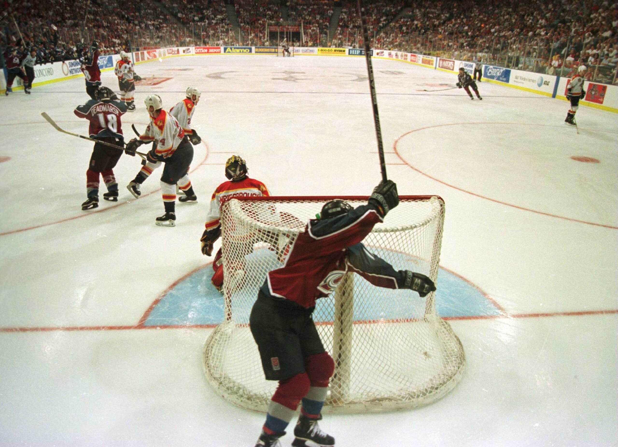 11 Jun 1996: Joe Sakic, captain of the Colorado Avalanche, celebrates as he rounds the net after teammate Uwe Krupp scored in triple overtime to defeat the Florida Panthers 1-0 in game four of the Stanley Cup Finals at Miami Arena in Miami, Florida. Sakic 11 Jun 1996: Joe Sakic, captain of the Colorado Avalanche, celebrates as he rounds the net after teammate Uwe Krupp scored in triple overtime to defeat the Florida Panthers 1-0 in game four of the Stanley Cup Finals at Miami Arena in Miami, Florida. Sakic