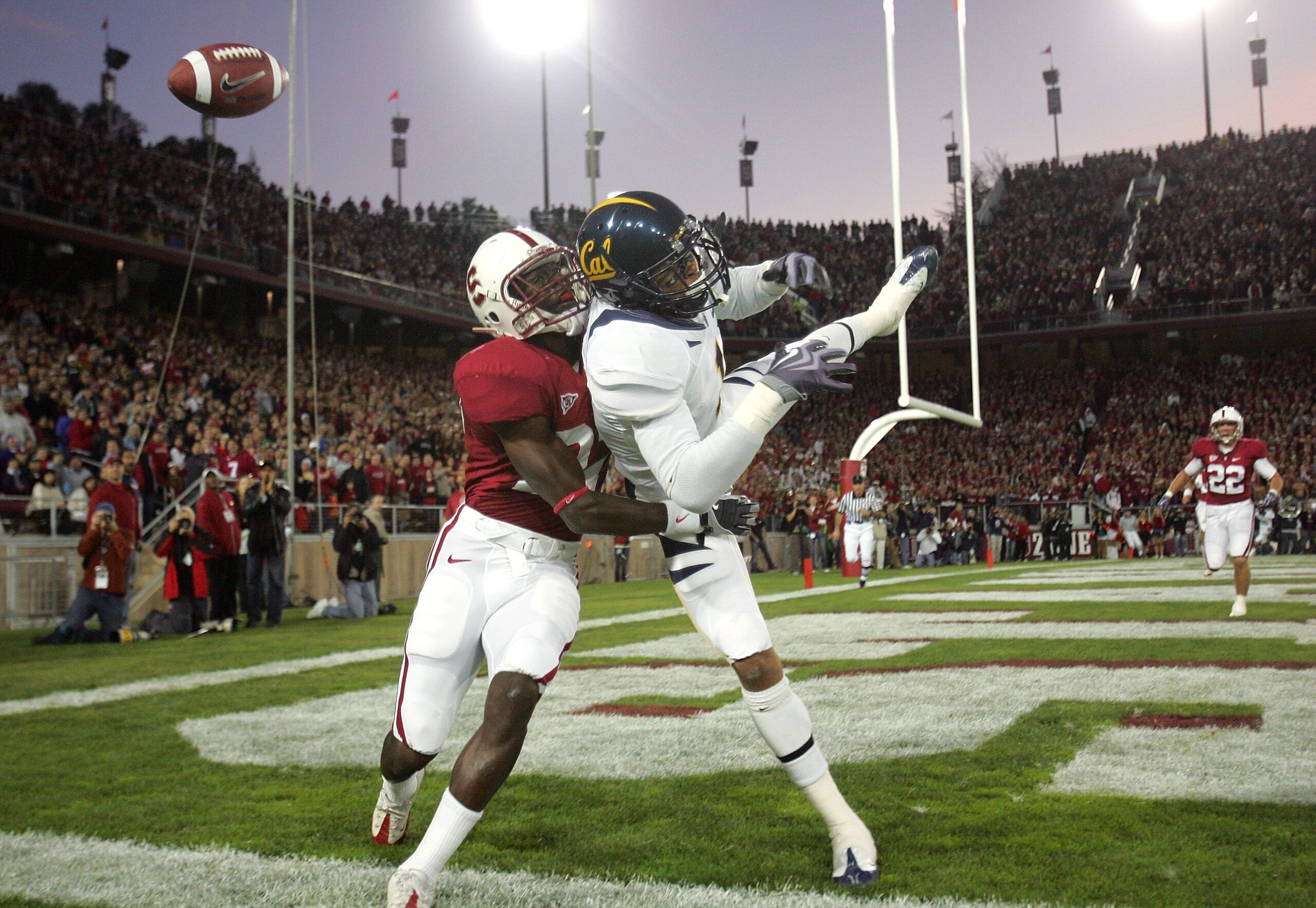 PALO ALTO, CA - NOVEMBER 21:  Johnson Bademosi #27 of the Stanford Cardinal breaks up a pass intended for Marvin Jones #1 of the California Bears at Stanford Stadium on November 21, 2009 in Palo Alto, California.  (Photo by Ezra Shaw/Getty Images)