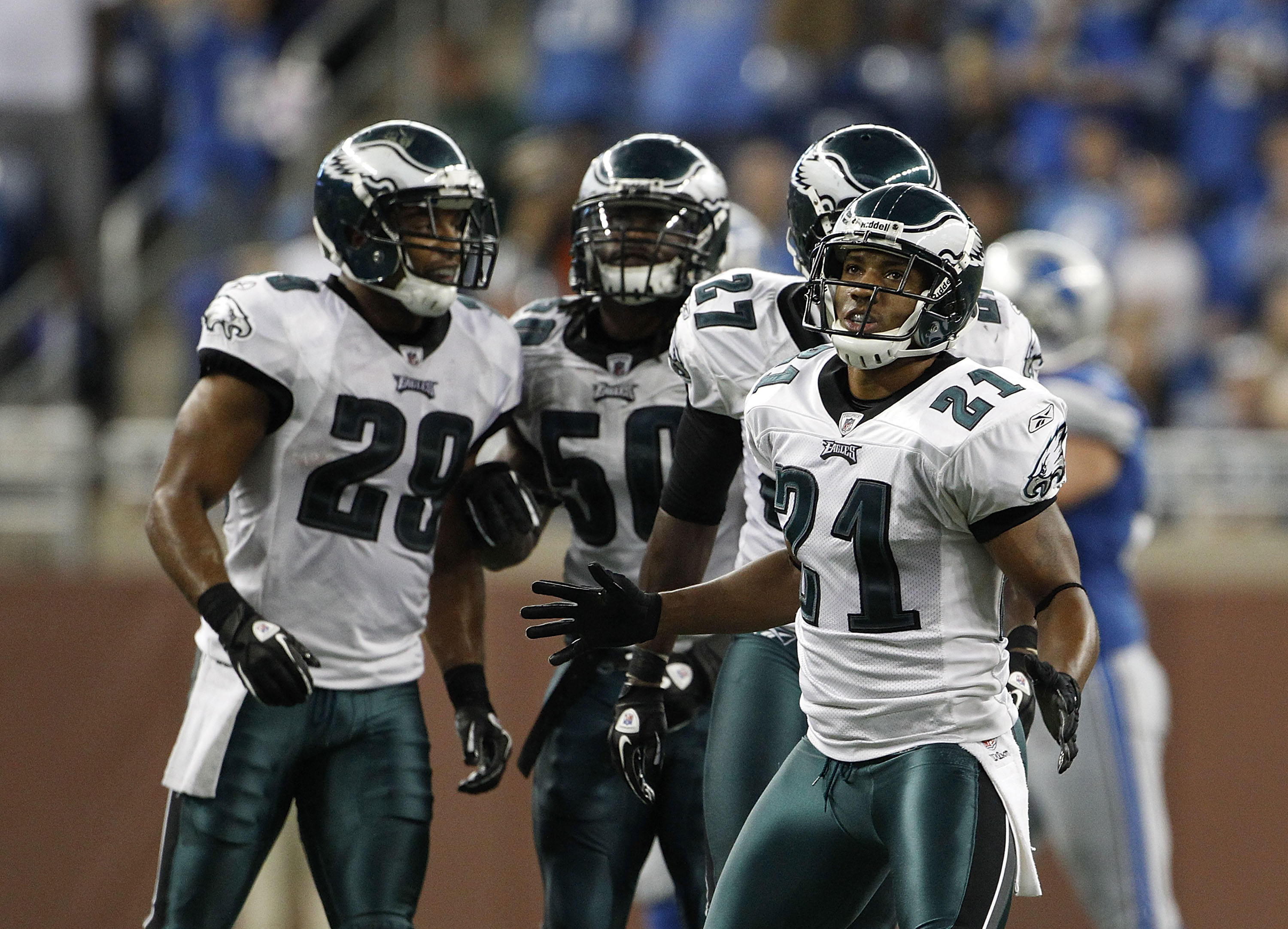 DETROIT - SEPTEMBER 19: Joselio Hanson #21 and Nate Allen #29 of the Philadelphia Eagles celebrates after stoping the Detroit Lions on a fourth down play late in the game at Ford Field on September 19, 2010 in Detroit, Michigan. The Eagles defeated the Li