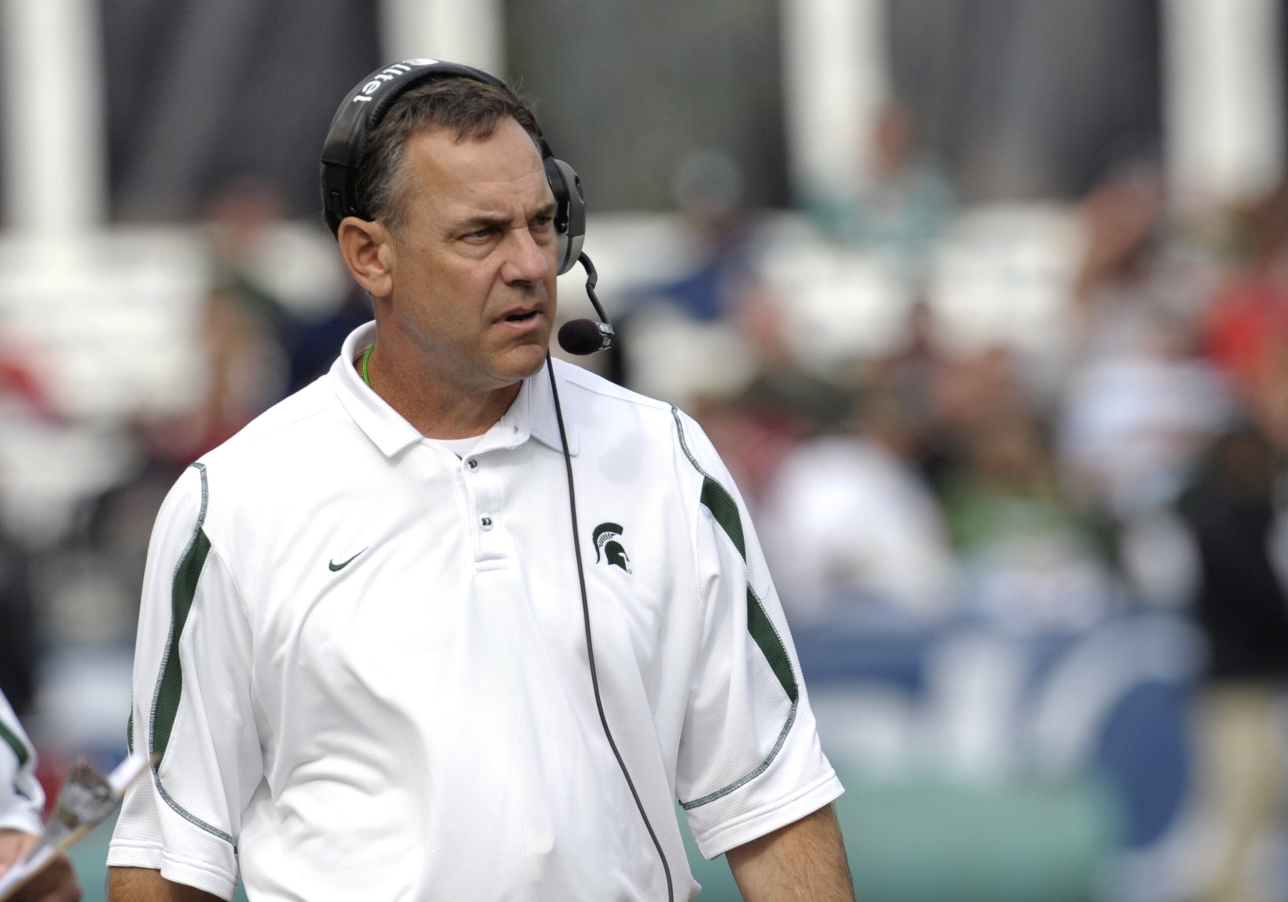 ORLANDO, FL - JANUARY 1: Coach Mark Dantonio of the Michigan State Spartans directs play against the Georgia Bulldogs at the 2009 Capital One Bowl at the Citrus Bowl on January 1, 2009 in Orlando, Florida.  (Photo by Al Messerschmidt/Getty Images)