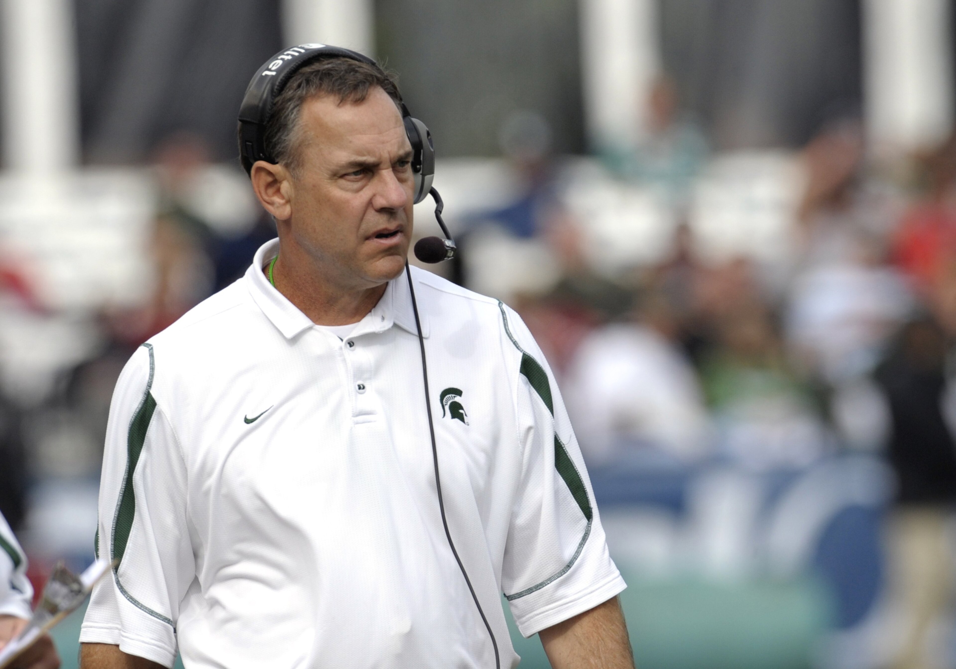 ORLANDO, FL - JANUARY 1: Coach Mark Dantonio of the Michigan State Spartans directs play against the Georgia Bulldogs at the 2009 Capital One Bowl at the Citrus Bowl on January 1, 2009 in Orlando, Florida.  (Photo by Al Messerschmidt/Getty Images)