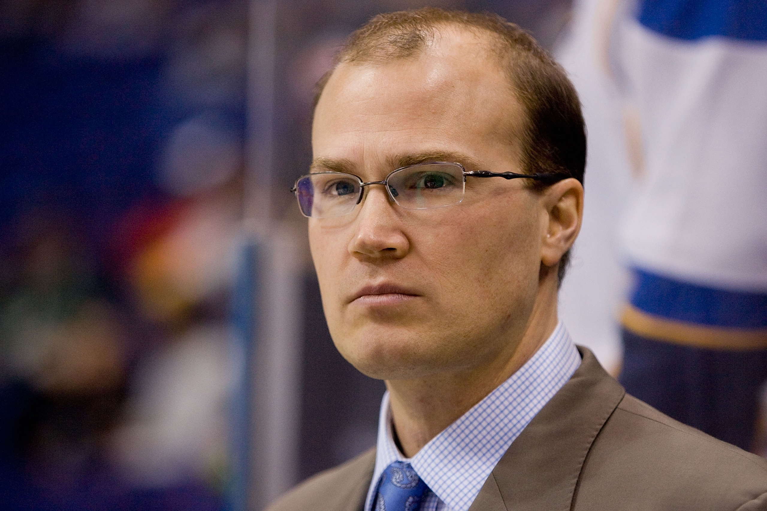 ST. LOUIS, MO - JANUARY 14: Head coach Davis Payne of the St. Louis Blues looks on from the bench during warm-ups prior to playing against the Minnesota Wild at the Scottrade Center on January 14, 2010 in St. Louis, Missouri.  (Photo by Dilip Vishwanat/Ge