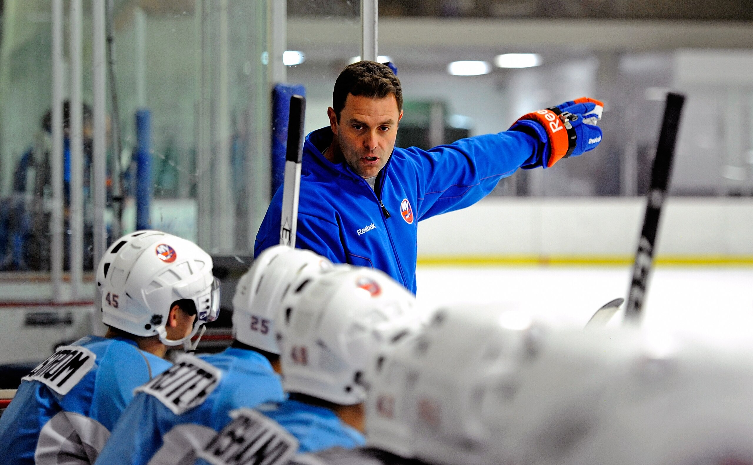 SYOSSET, NY - SEPTEMBER 13:  Coach Scott Gordon of the New York Islanders instructs players during rookie training camp at Ice Works on September 13, 2010 in Syosset, New York.  (Photo by Lou Capozzola/Getty Images)