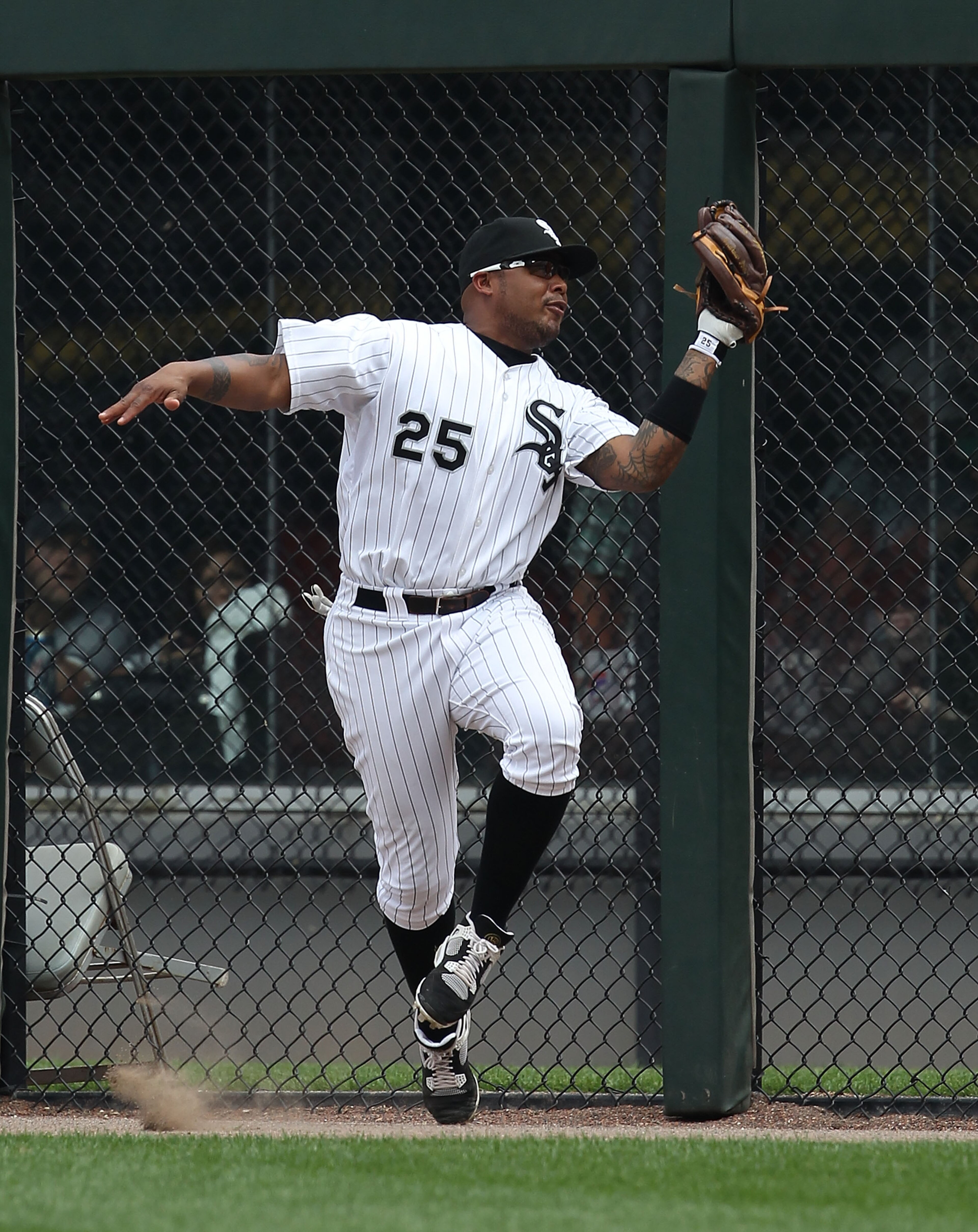 CHICAGO - AUGUST 29: Andruw Jones #25 of the Chicago White Sox catches a fly ball at the warning track against the New York Yankees at U.S. Cellular Field on August 29, 2010 in Chicago, Illinois. The Yankees defeated the White Sox 2-1. (Photo by Jonathan