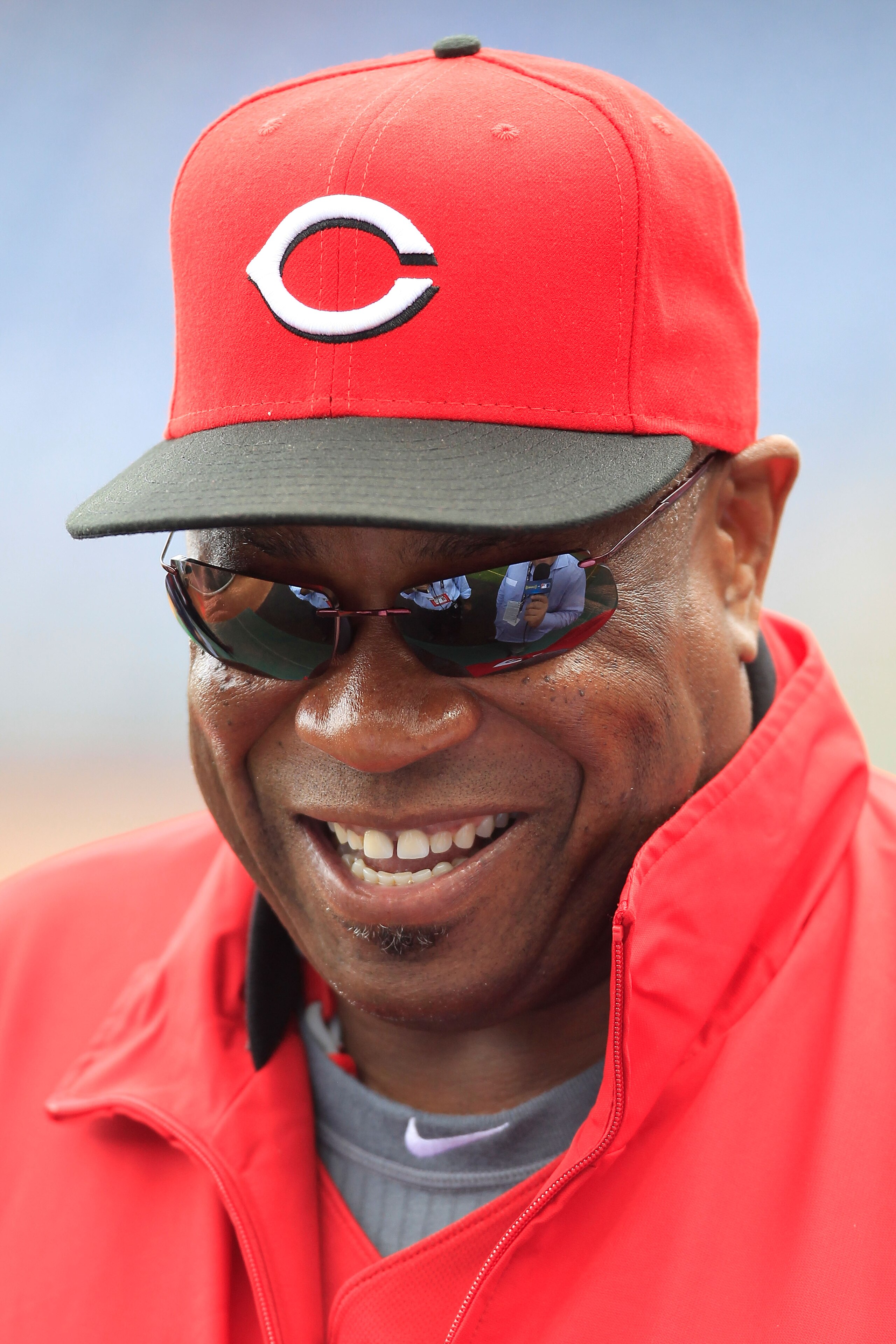 PHILADELPHIA - OCTOBER 06:  Manager Dusty Baker #12 of the Cincinnati Reds watches batting practice before Game 1 of the NLDS against the Philadelphia Phillies at Citizens Bank Park on October 6, 2010 in Philadelphia, Pennsylvania.  (Photo by Chris Trotma