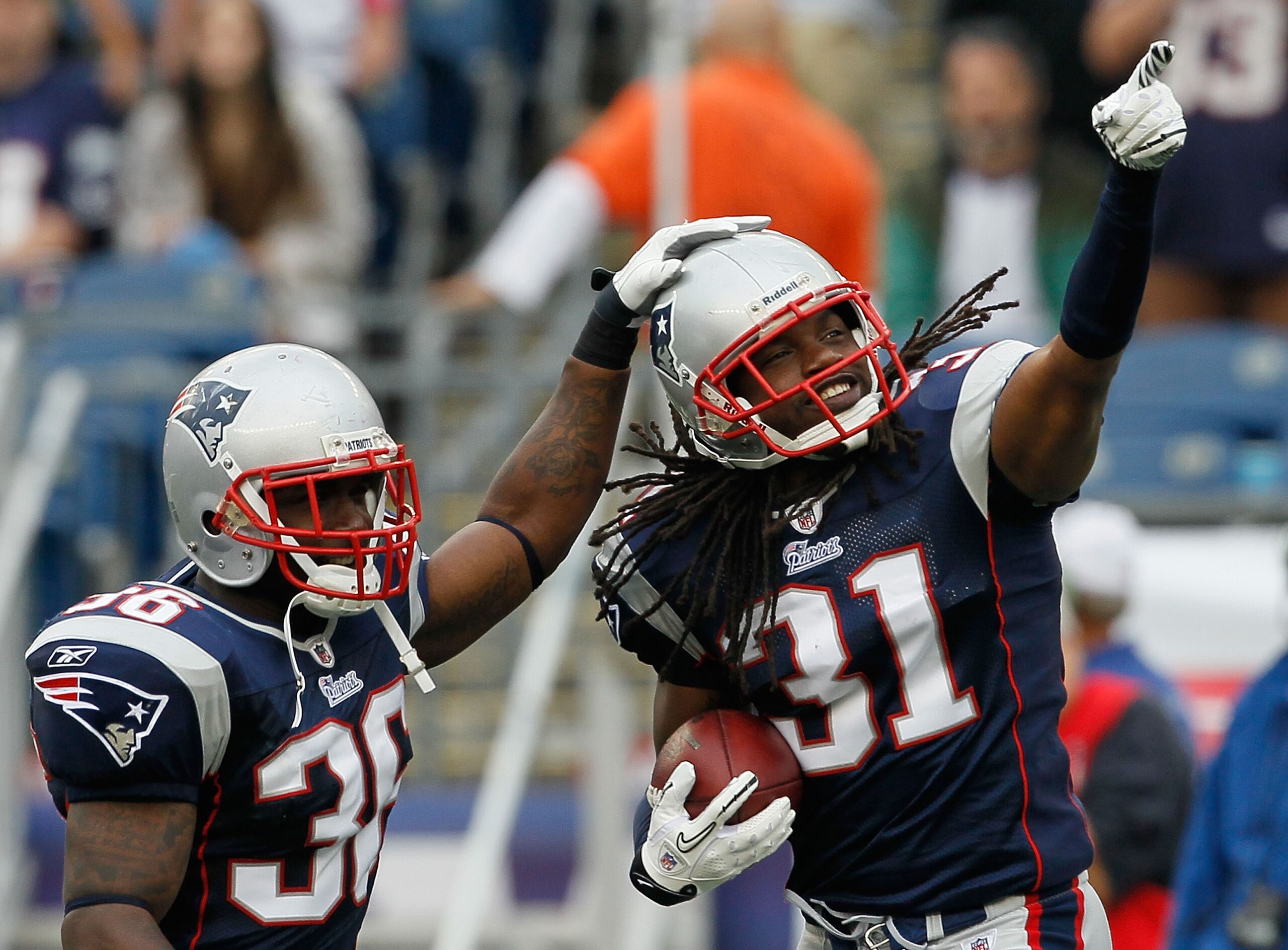 FOXBORO, MA - SEPTEMBER 26:  Brandon Meriweather  #31 of the New England Patriots reacts with teammate James Sanders #36 after Meriweather intercepted a pass against the Buffalo Bills in the second half at Gillette Stadium on September 26, 2010 in Foxboro