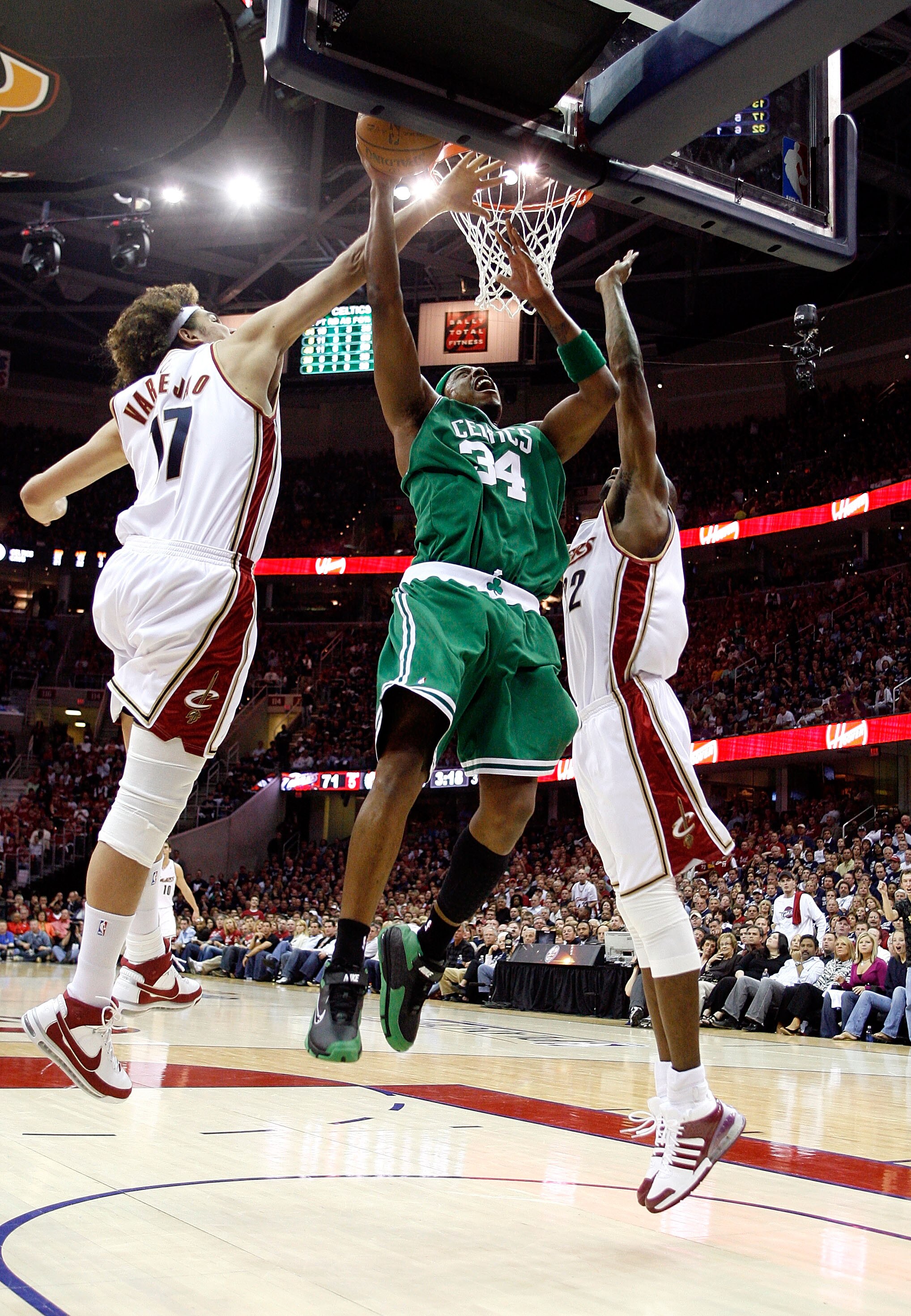 CLEVELAND - MAY 10:  Paul Pierce #34 of the Boston Celtics drives for a shot attempt against Anderson Varejao #17 and Joe Smith #32 of the Cleveland Cavaliers in Game Three of the 2008 NBA Eastern Conference Semifinals on May 10, 2008 at the Quicken Loans