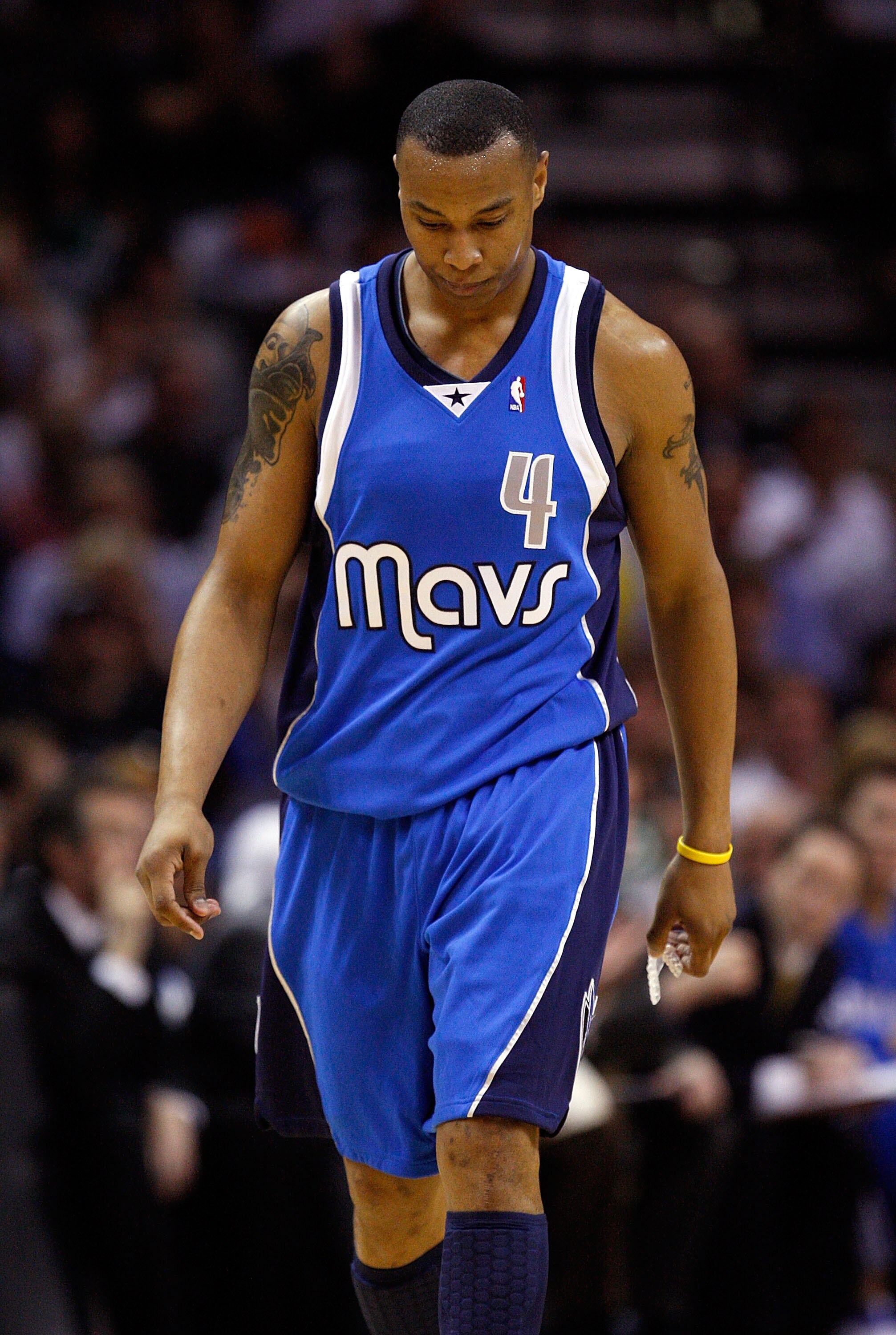 SAN ANTONIO - APRIL 23:  Forward Caron Butler #4 of the Dallas Mavericks walks off the court during play against the San Antonio Spurs in Game Three of the Western Conference Quarterfinals during the 2010 NBA Playoffs at AT&T Center on April 23, 2010 in S