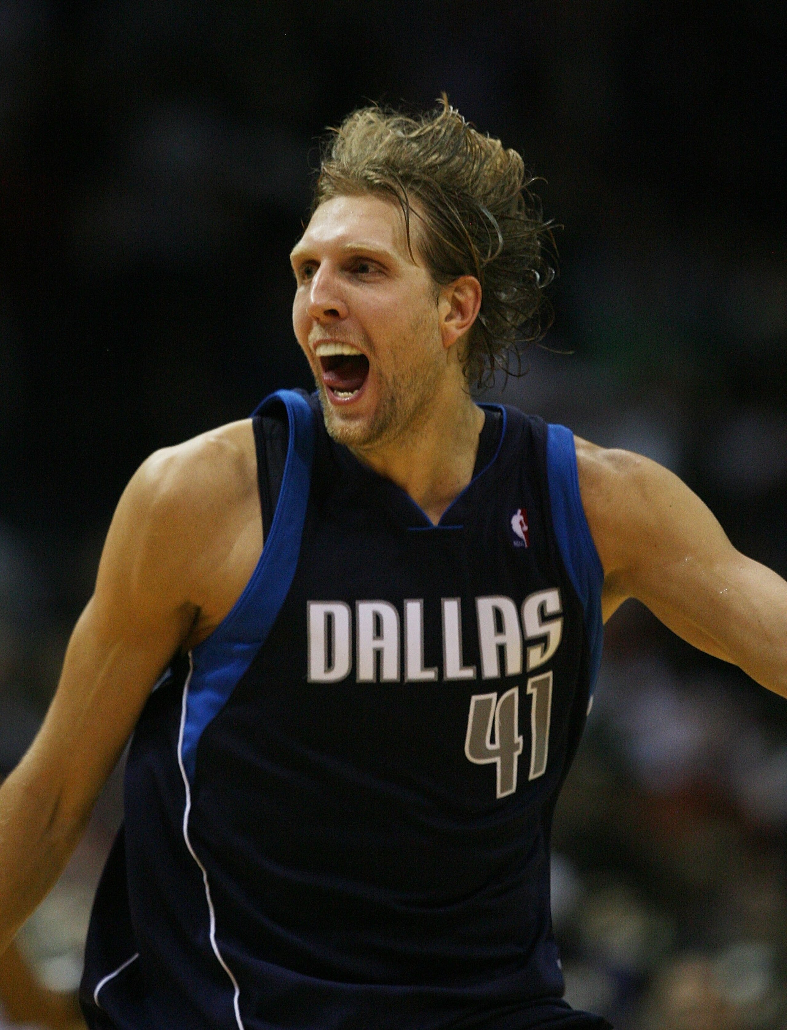 MILWAUKEE - NOVEMBER 16: Dirk Nowitzki #41 of the Dallas Mavericks celebrates hitting the game-winning shot with 3.3 seconds on the clock against the Milwaukee Bucks at the Bradley Center on November 16, 2009 in Milwaukee, Wisconsin. The Mavericks defeate
