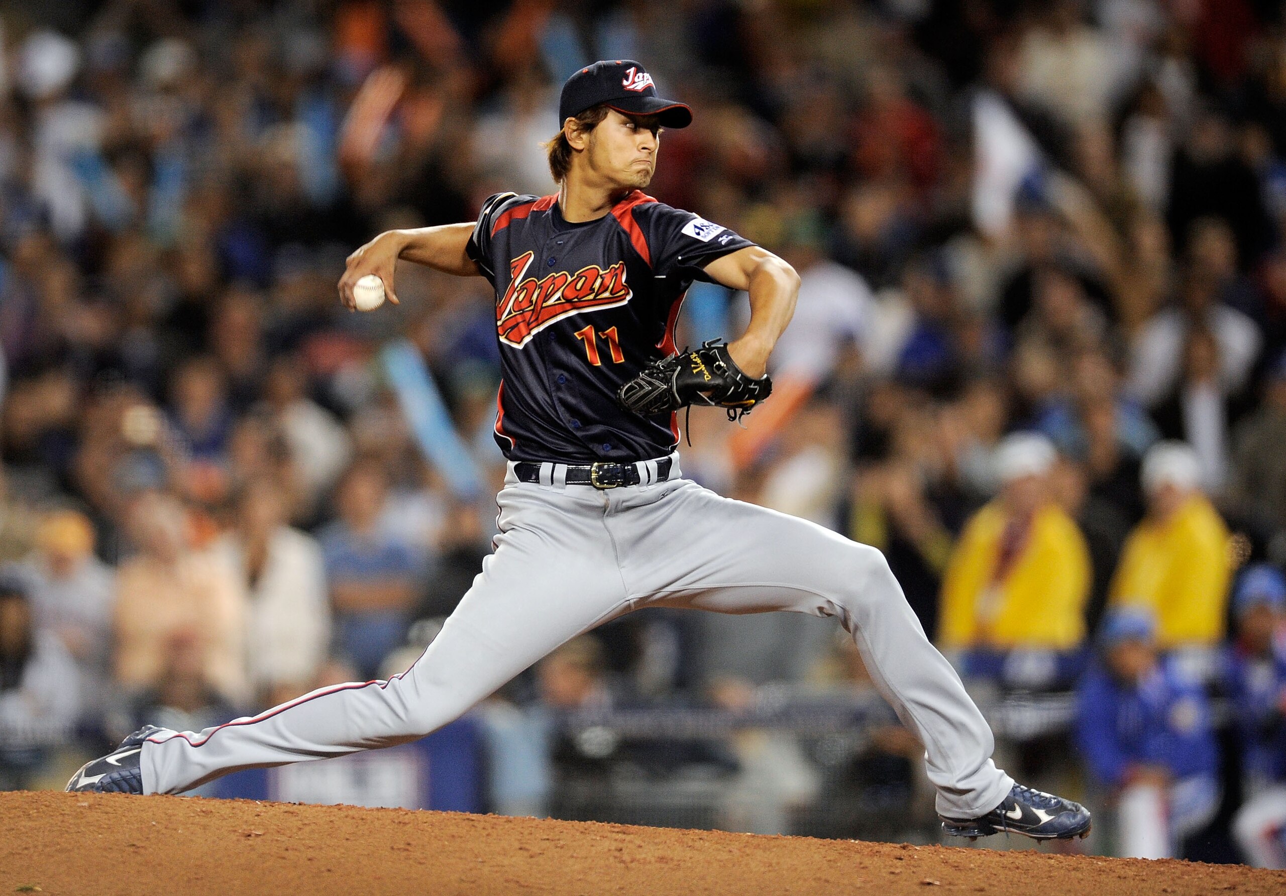 LOS ANGELES, CA - MARCH 23:  Relief pitcher Yu Darvish #11 of Japan throws a pitch against Korea during the finals of the 2009 World Baseball Classic on March 23, 2009 at Dodger Stadium in Los Angeles, California. Japan won 5-3 in 10 innings.  (Photo by K