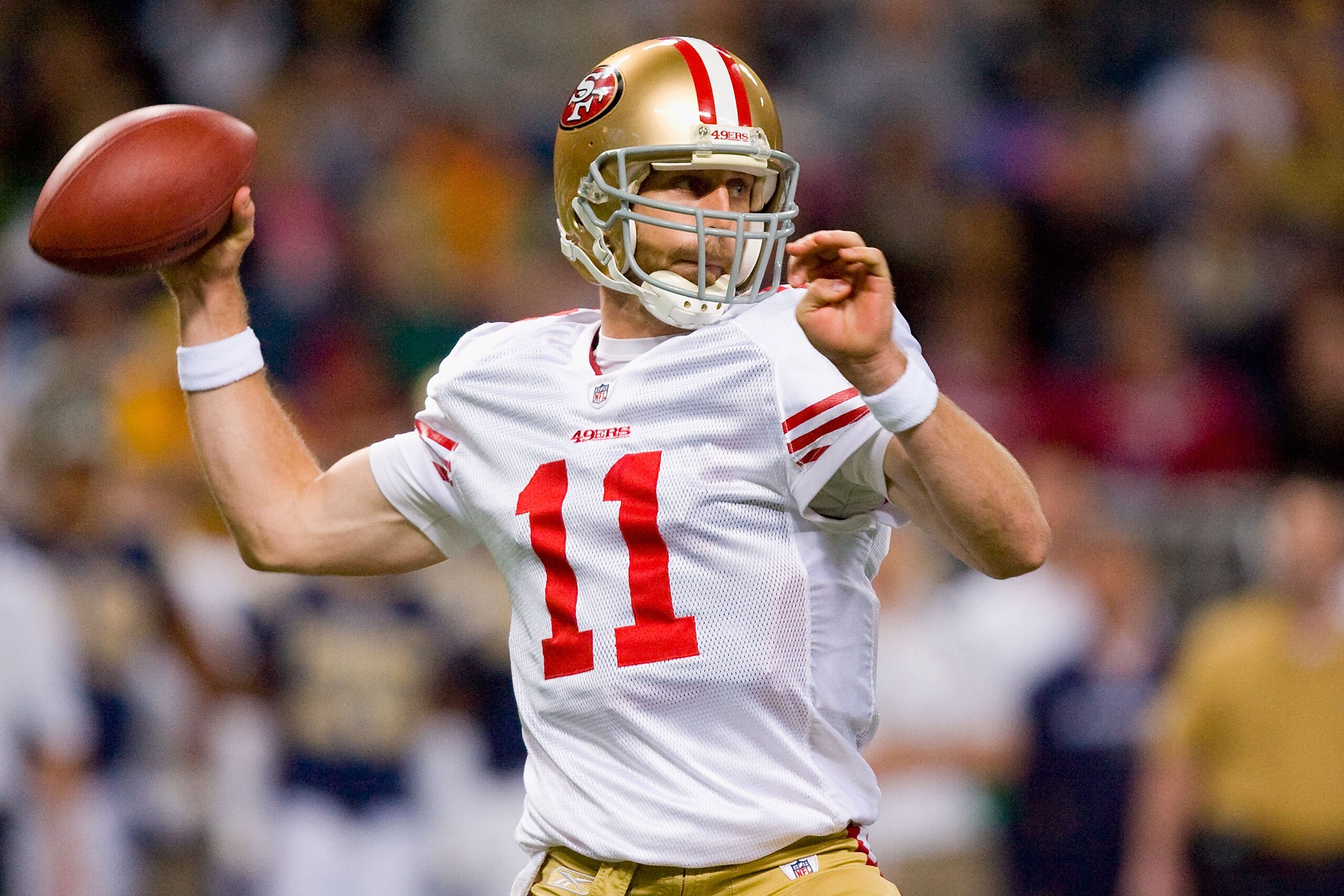 ST. LOUIS - JANUARY 3: Alex Smith #11 of the San Francisco 49ers looks to pass against the St. Louis Rams at the Edward Jones Dome on January 3, 2010 in St. Louis, Missouri.  (Photo by Dilip Vishwanat/Getty Images)
