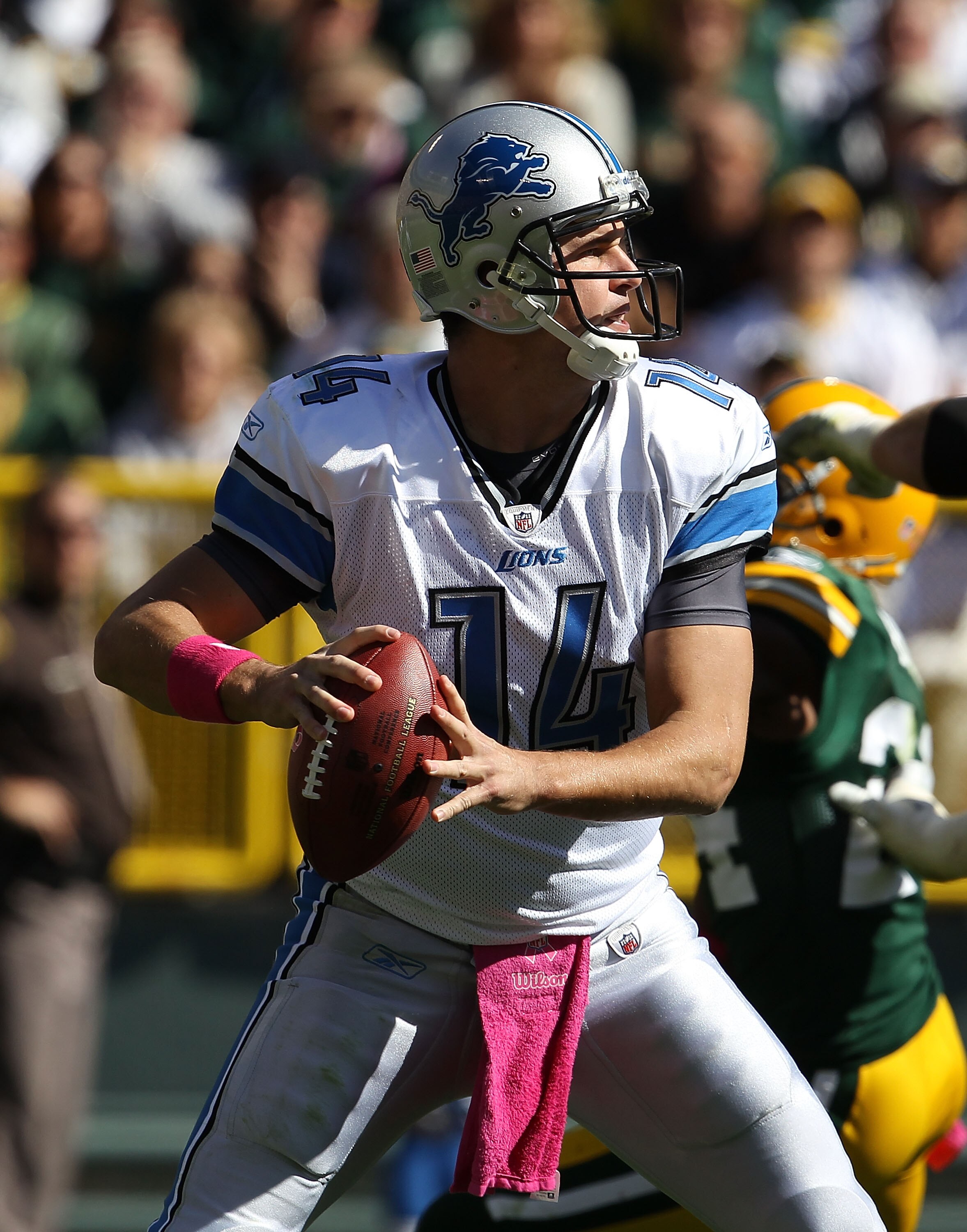GREEN BAY, WI - OCTOBER 03: Shaun Hill #14 of the Detroit Lions look to pass against the Green Bay Packers at Lambeau Field on October 3, 2010 in Green Bay, Wisconsin. The Packers defeated the Lions 28-26. (Photo by Jonathan Daniel/Getty Images)
