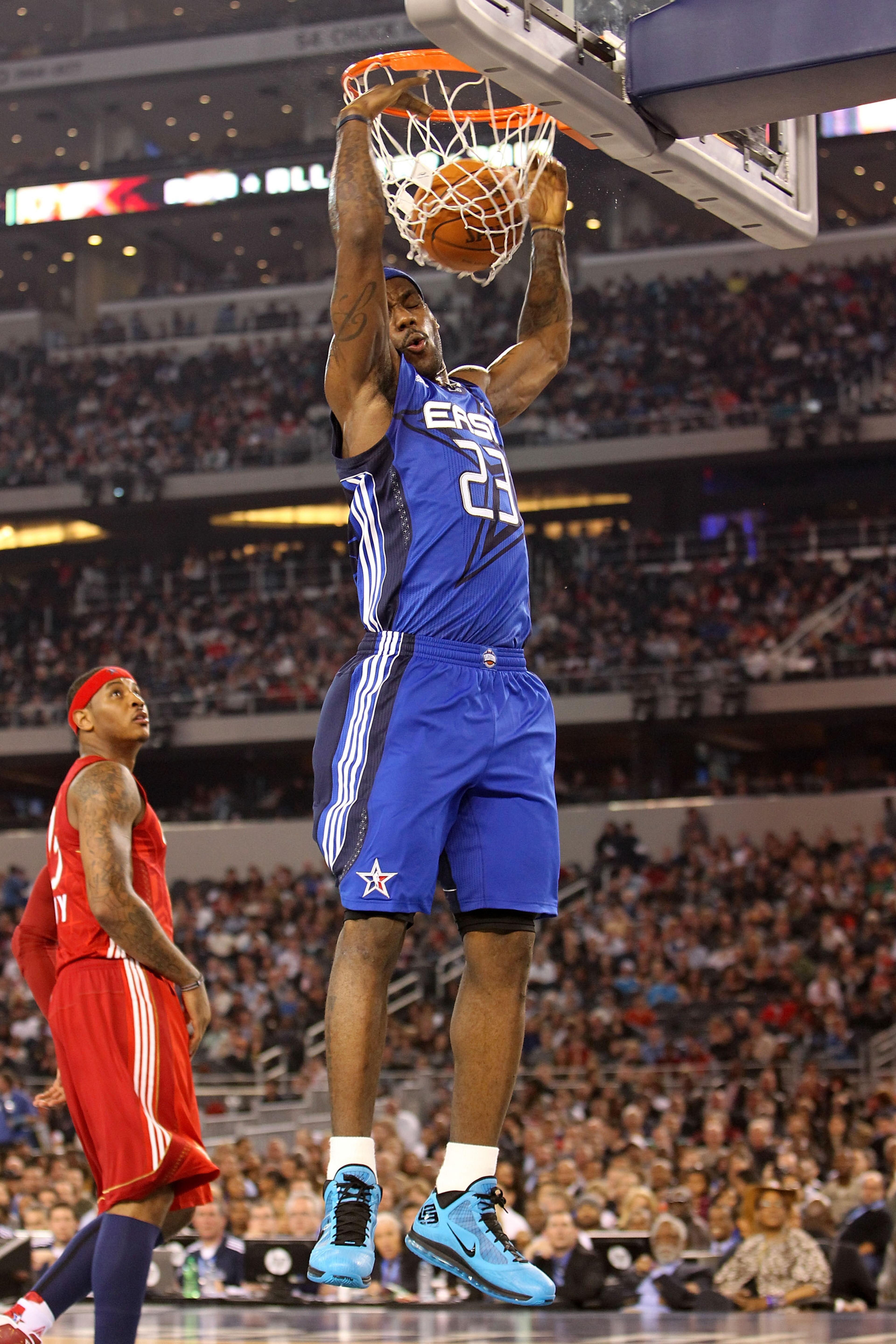 ARLINGTON, TX - FEBRUARY 14: LeBron James #23 of the Eastern Conference dunks against Carmelo Anthony #15 of the Western Conference during the third quarter of the NBA All-Star Game, part of 2010 NBA All-Star Weekend at Cowboys Stadium on February 14, 20 ARLINGTON, TX - FEBRUARY 14: LeBron James #23 of the Eastern Conference dunks against Carmelo Anthony #15 of the Western Conference during the third quarter of the NBA All-Star Game, part of 2010 NBA All-Star Weekend at Cowboys Stadium on February 14, 20