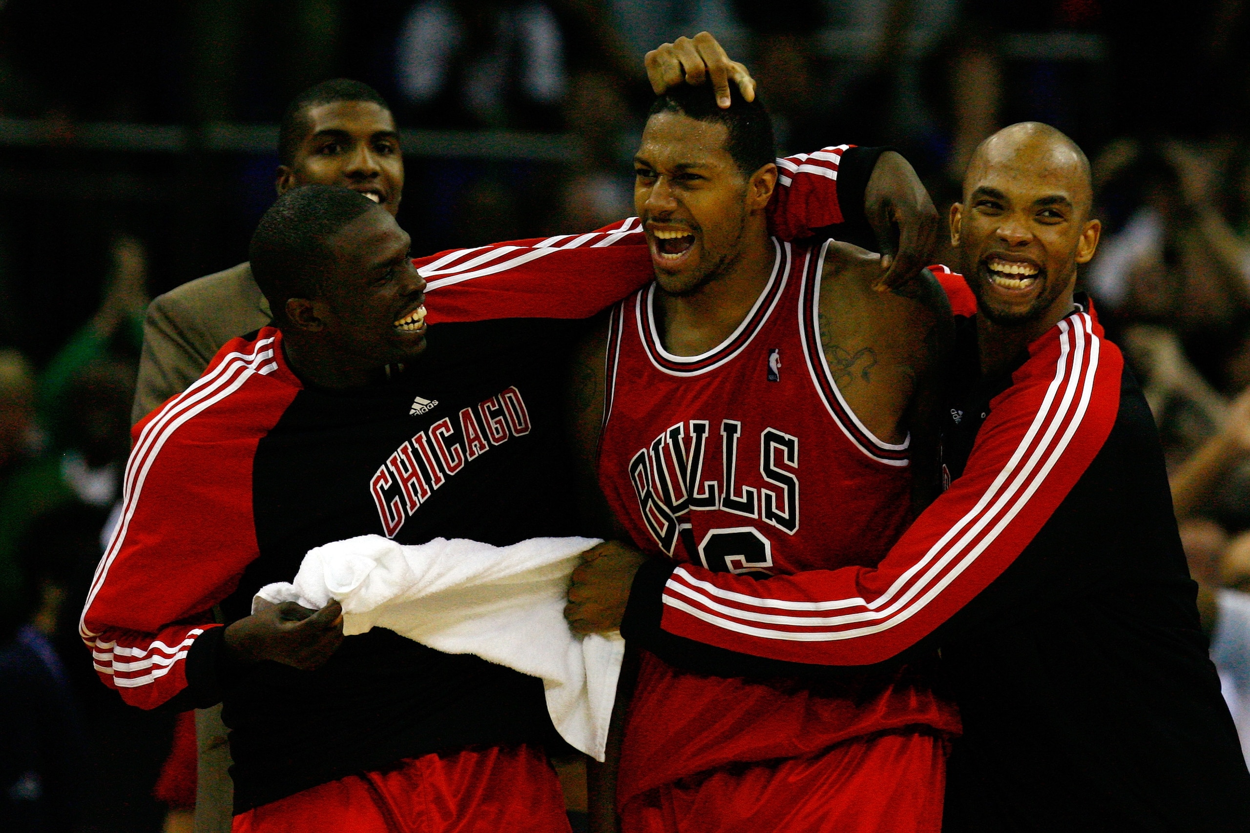 LONDON, ENGLAND - OCTOBER 06:  James Johnson (C) of the Chicago Bulls celebrates with team mates after scoring the winning shot in the final second during the NBA pre-season game as part of the 2009 NBA Europe Live Tour between Chicago Bulls and Utah Jazz