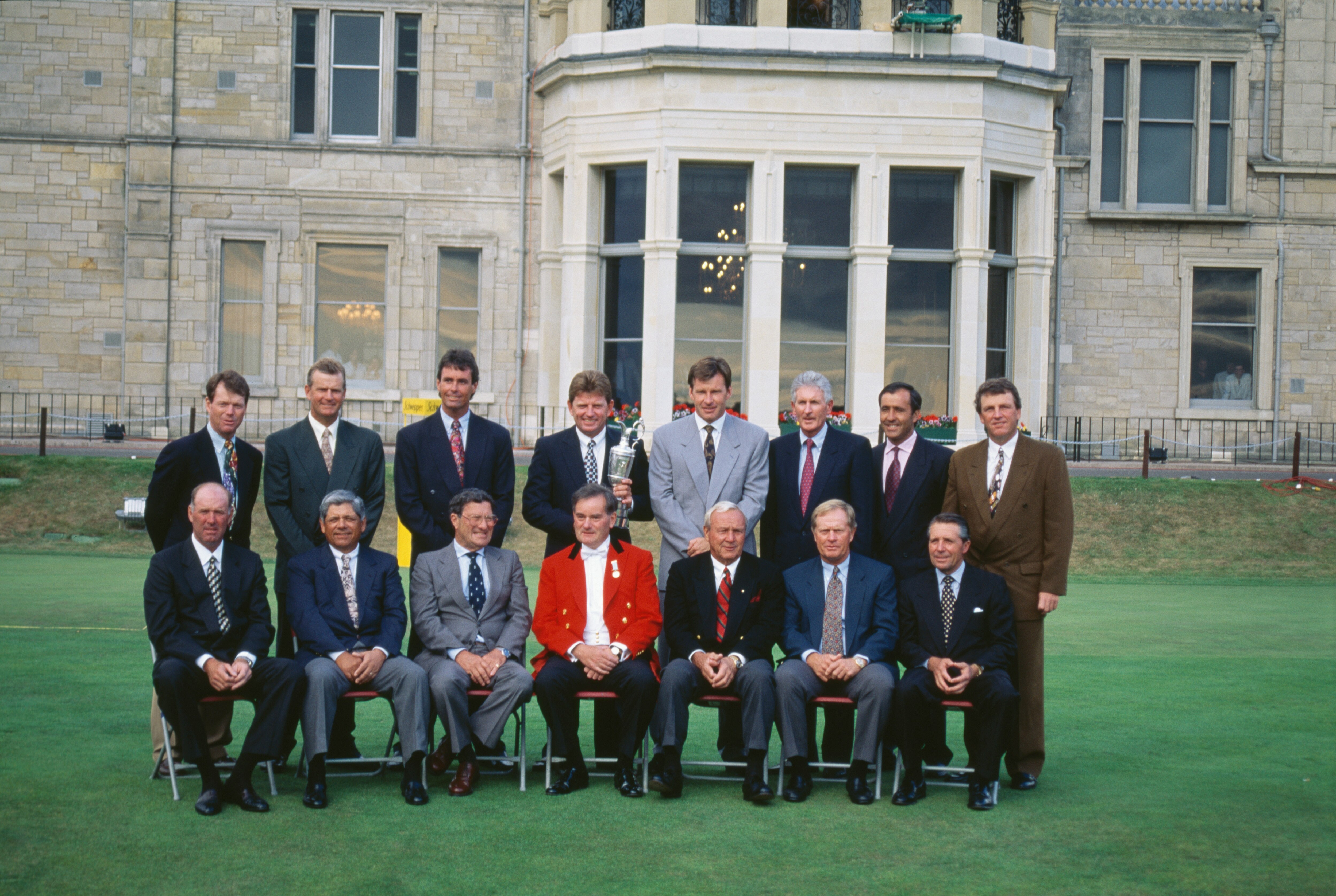 Back row left to right the former winners of the Claret Jug, Tom Watson, Sandy Lyle, Ian Baker Finch, Nick Price, Nick Faldo, Bob Charles, Severiano Ballesteros, Mark Calcavecchia front row, Tom Weiskopf, Lee Trevino,Peter Thompson,unknown, Arnold Palmer,