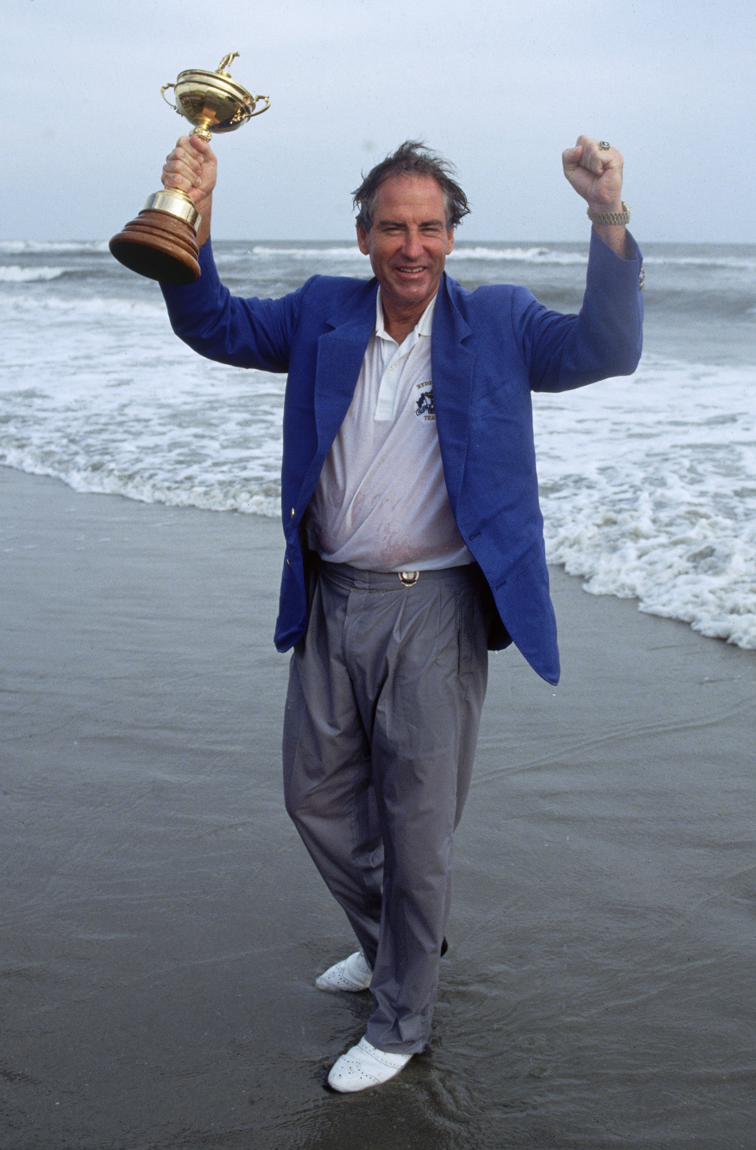 KIAWAH ISLAND - SEPTEMBER 29:  Dave Stockton of the USA celebrates on the beach with the Cup, September 29 1991, after victory in the Ryder Cup at Kiawah Island in South Carolina, USA. (Photo by Stephen Munday/Getty Images)