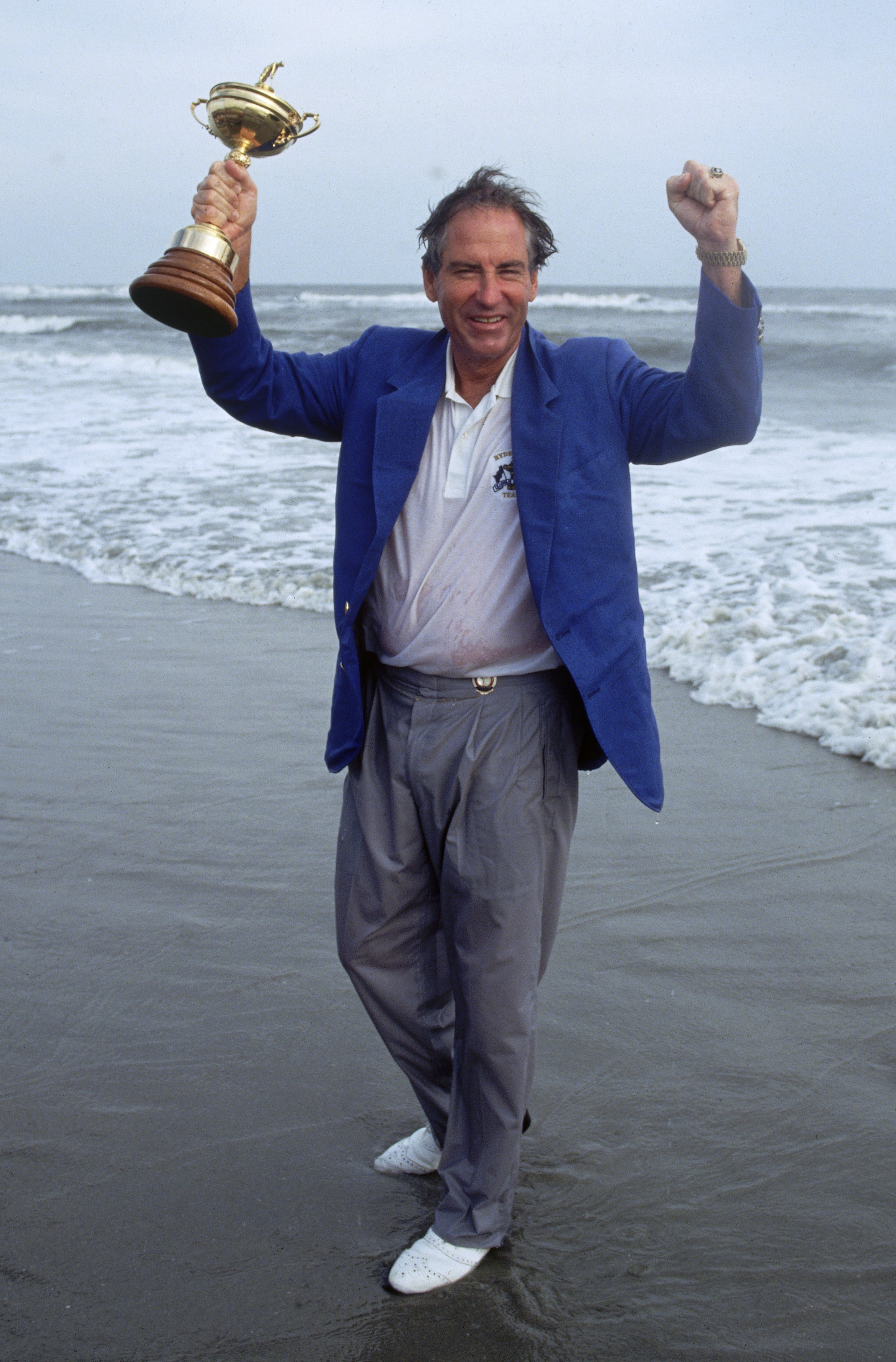 KIAWAH ISLAND - SEPTEMBER 29:  Dave Stockton of the USA celebrates on the beach with the Cup, September 29 1991, after victory in the Ryder Cup at Kiawah Island in South Carolina, USA. (Photo by Stephen Munday/Getty Images)