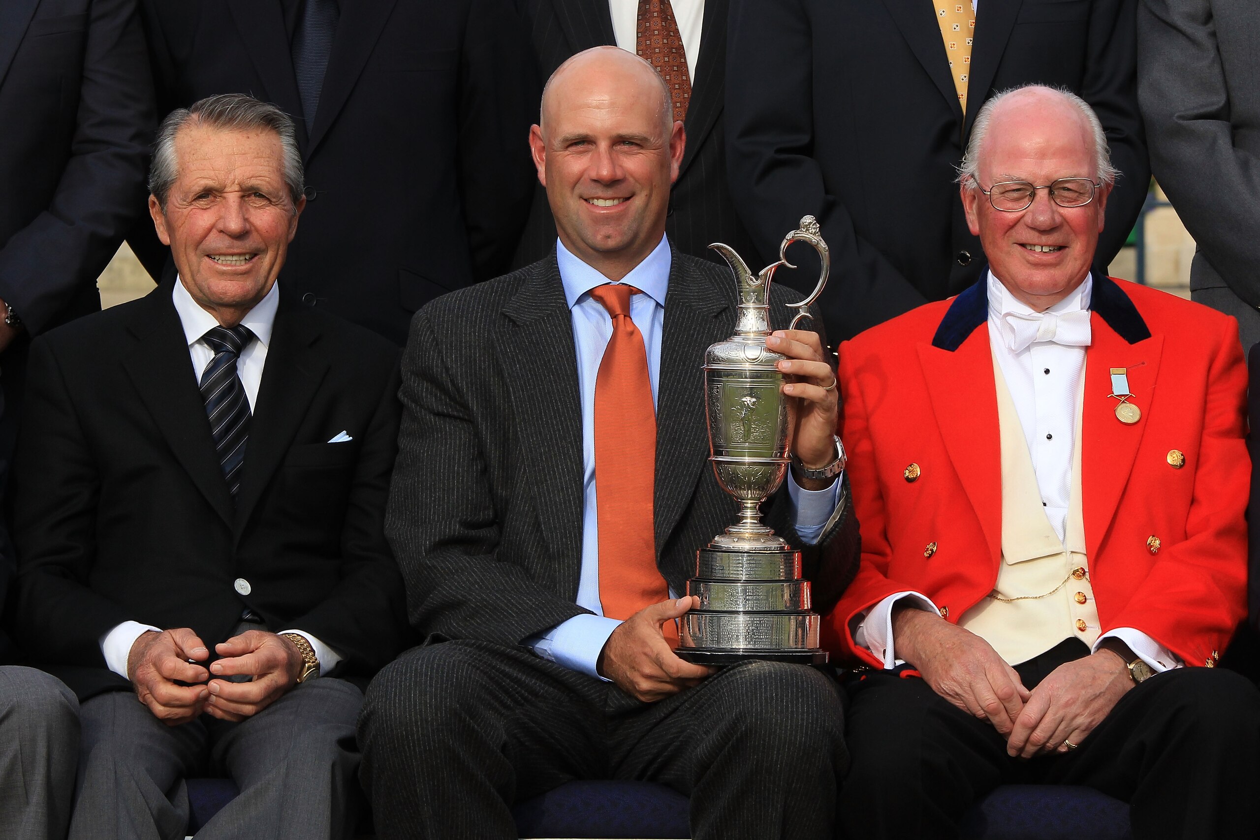 ST ANDREWS, SCOTLAND - JULY 13:  (L-R) Gary Player of South Africa, Stewart Cink, and Colin M Brown, Captain of the Royal and Ancient Golf Club of St. Andrews pose for a photo prior to the 139th Open Championship on the Old Course, St Andrews on July 13, 
