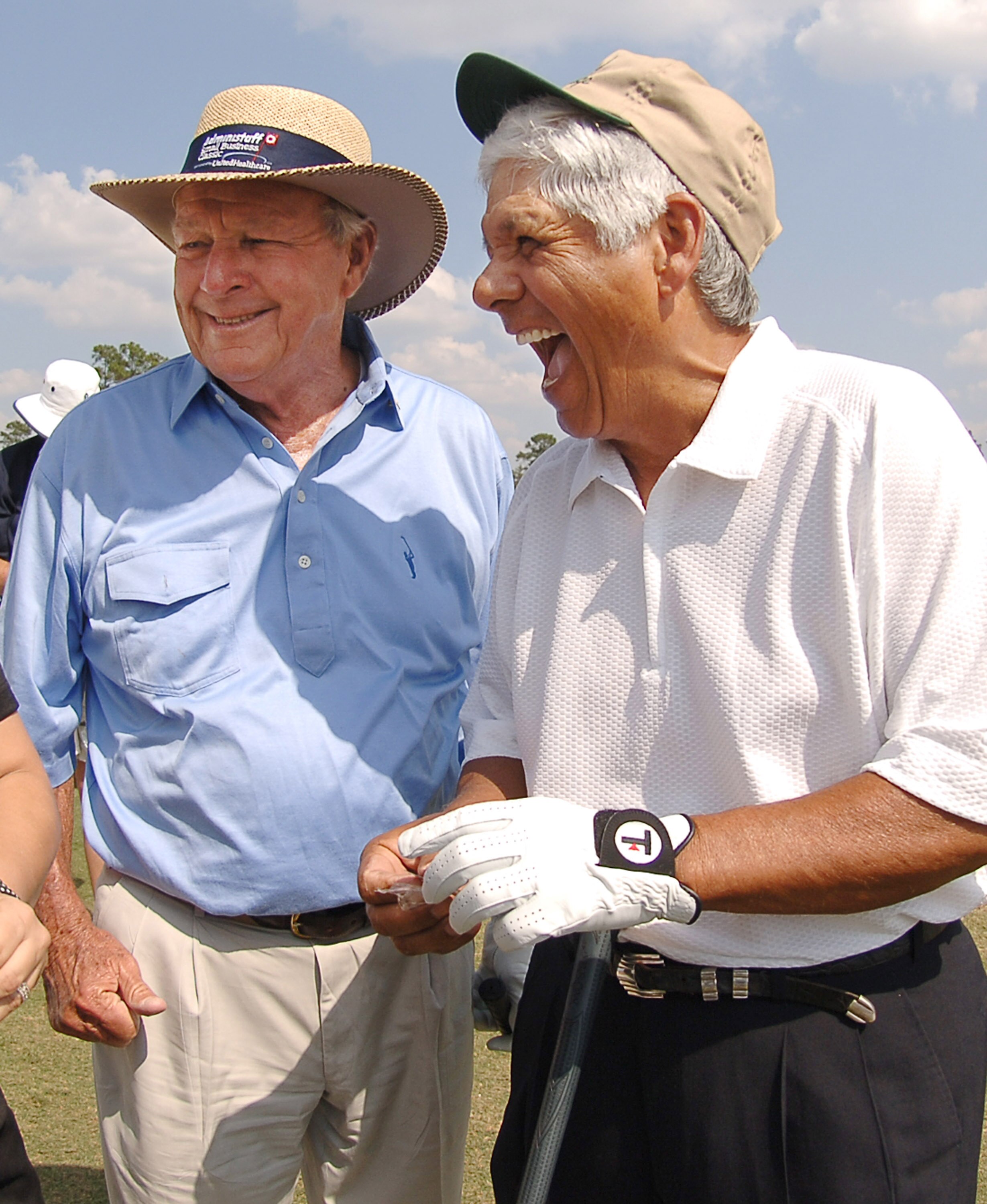UNITED STATES - OCTOBER 15:  Arnold Palmer and Lee Trevino share a laugh with the honorary observers prior to the start of their second round in the Champions Tour 2005 Adminstaff Small Business Classic at Augusta Pines Country Club in Spring, Texas Octob