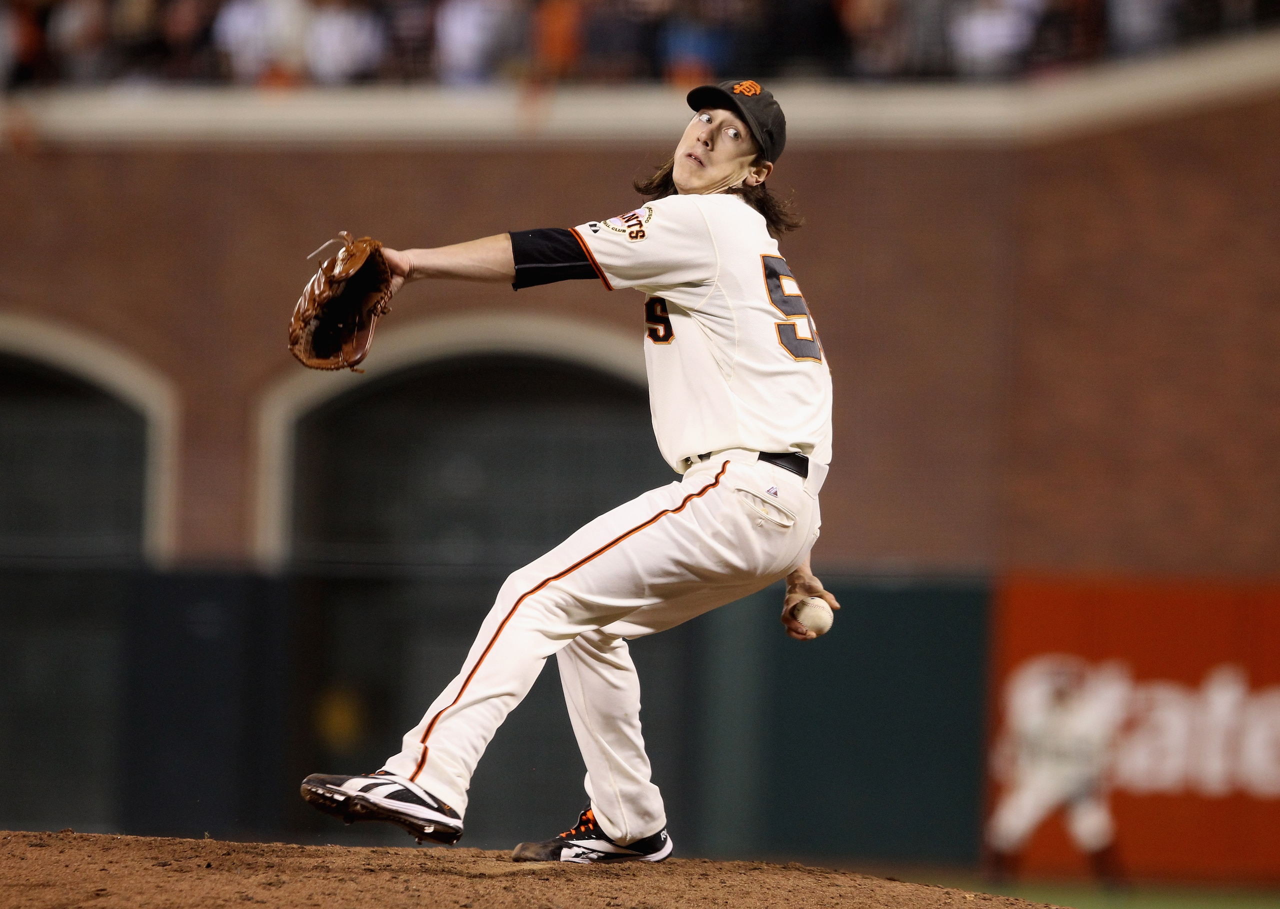 SAN FRANCISCO - OCTOBER 07:  Tim Lincecum #55 of the San Francisco Giants pitches against the Atlanta Braves in game 1 of the NLDS at AT&T Park on October 7, 2010 in San Francisco, California.  (Photo by Ezra Shaw/Getty Images)