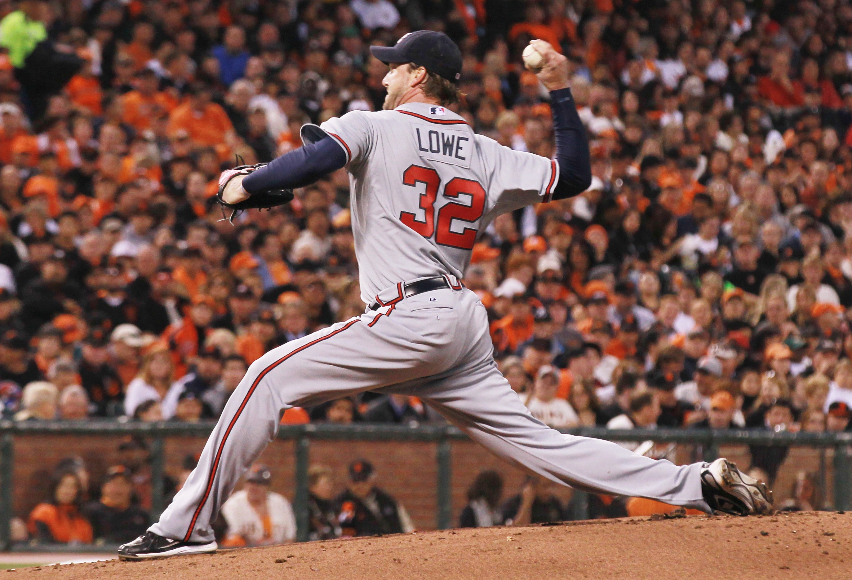 SAN FRANCISCO - OCTOBER 07:  Derek Lowe #32 of the Atlanta Braves pitches against San Francisco Giants during the first inning of game one of the NLDS at AT&T Park on October 7, 2010 in San Francisco, California.  (Photo by Justin Sullivan/Getty Images)