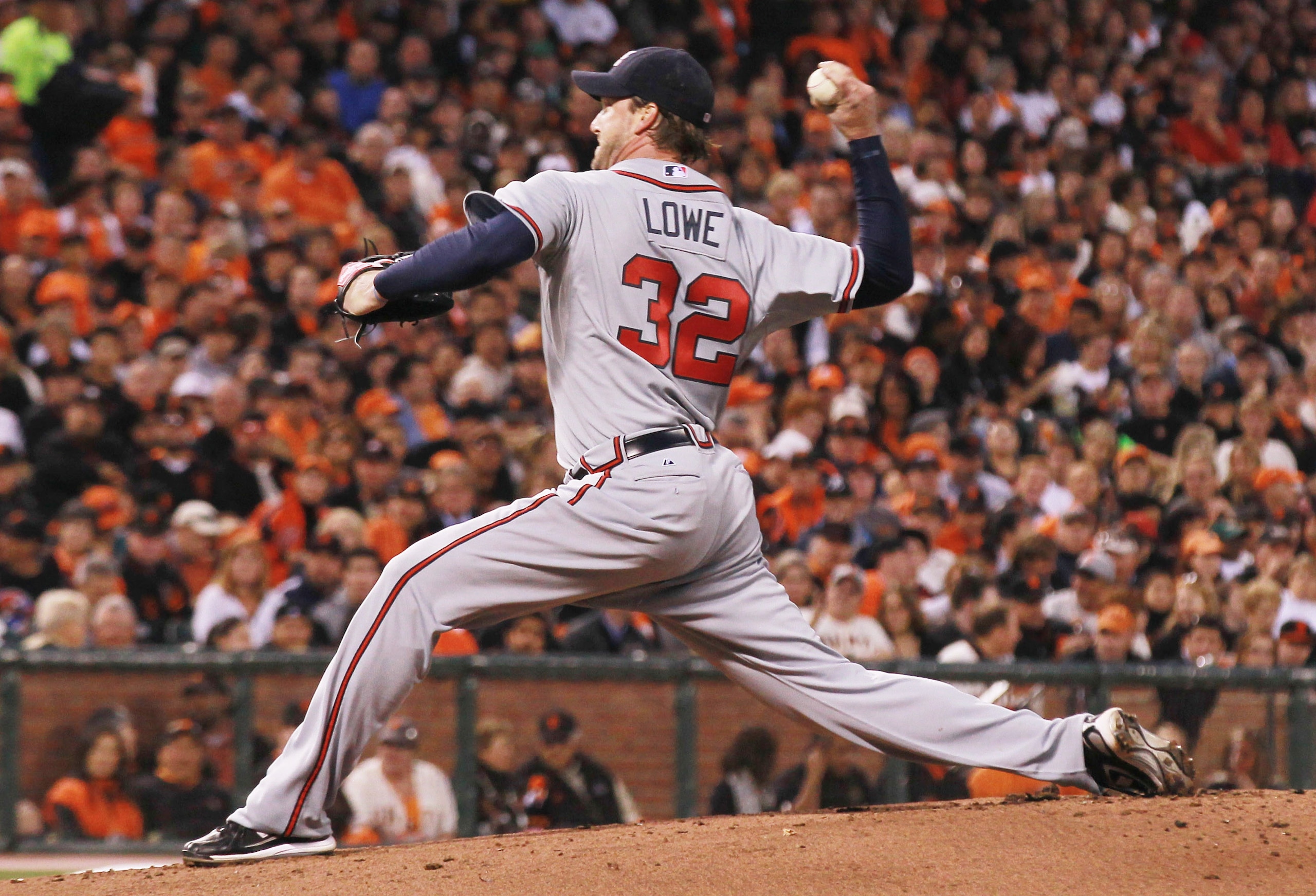 SAN FRANCISCO - OCTOBER 07:  Derek Lowe #32 of the Atlanta Braves pitches against San Francisco Giants during the first inning of game one of the NLDS at AT&T Park on October 7, 2010 in San Francisco, California.  (Photo by Justin Sullivan/Getty Images)