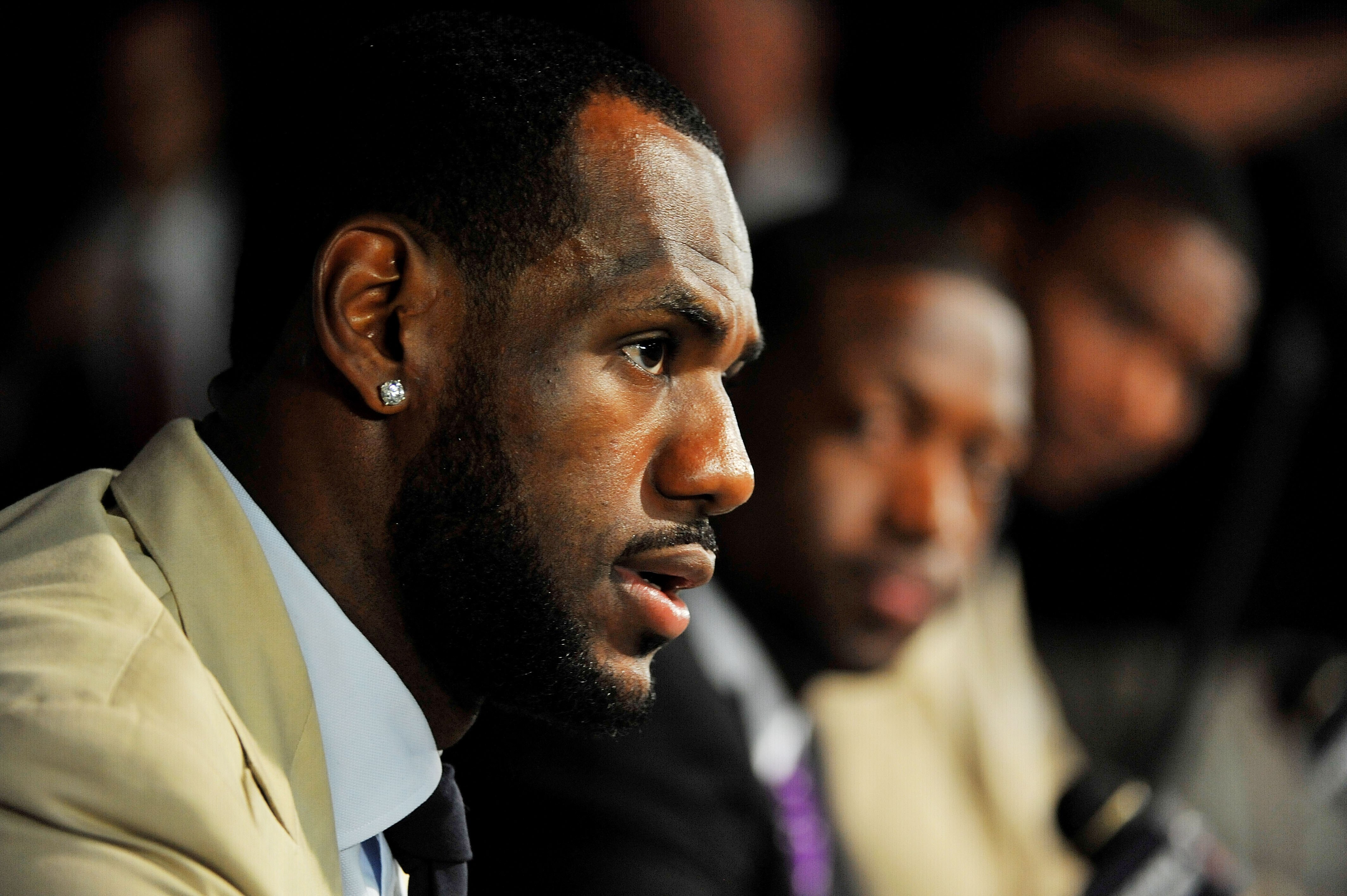 MIAMI - JULY 09:  LeBron James #6, (L) Dwyane Wade #3 (C) and Chris Bosh #1 of the Miami Heat talk during a press conference after a welcome party at American Airlines Arena on July 9, 2010 in Miami, Florida.  (Photo by Doug Benc/Getty Images)