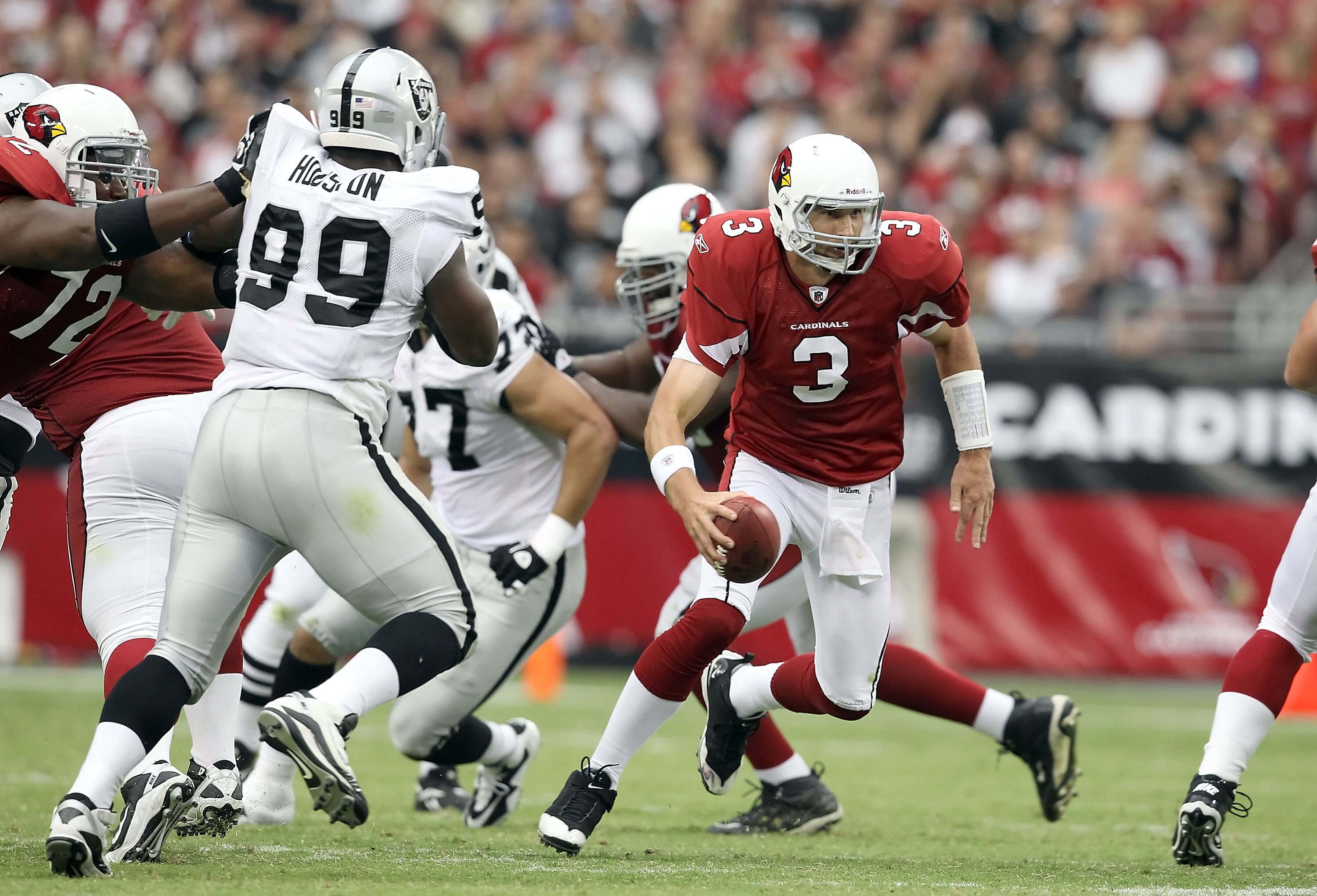 GLENDALE, AZ - SEPTEMBER 26:  Quarterback Derek Anderson #3 of the Arizona Cardinals scrambles with the football during the NFL game against the Oakland Raiders at the University of Phoenix Stadium on September 26, 2010 in Glendale, Arizona.  The Cardinal