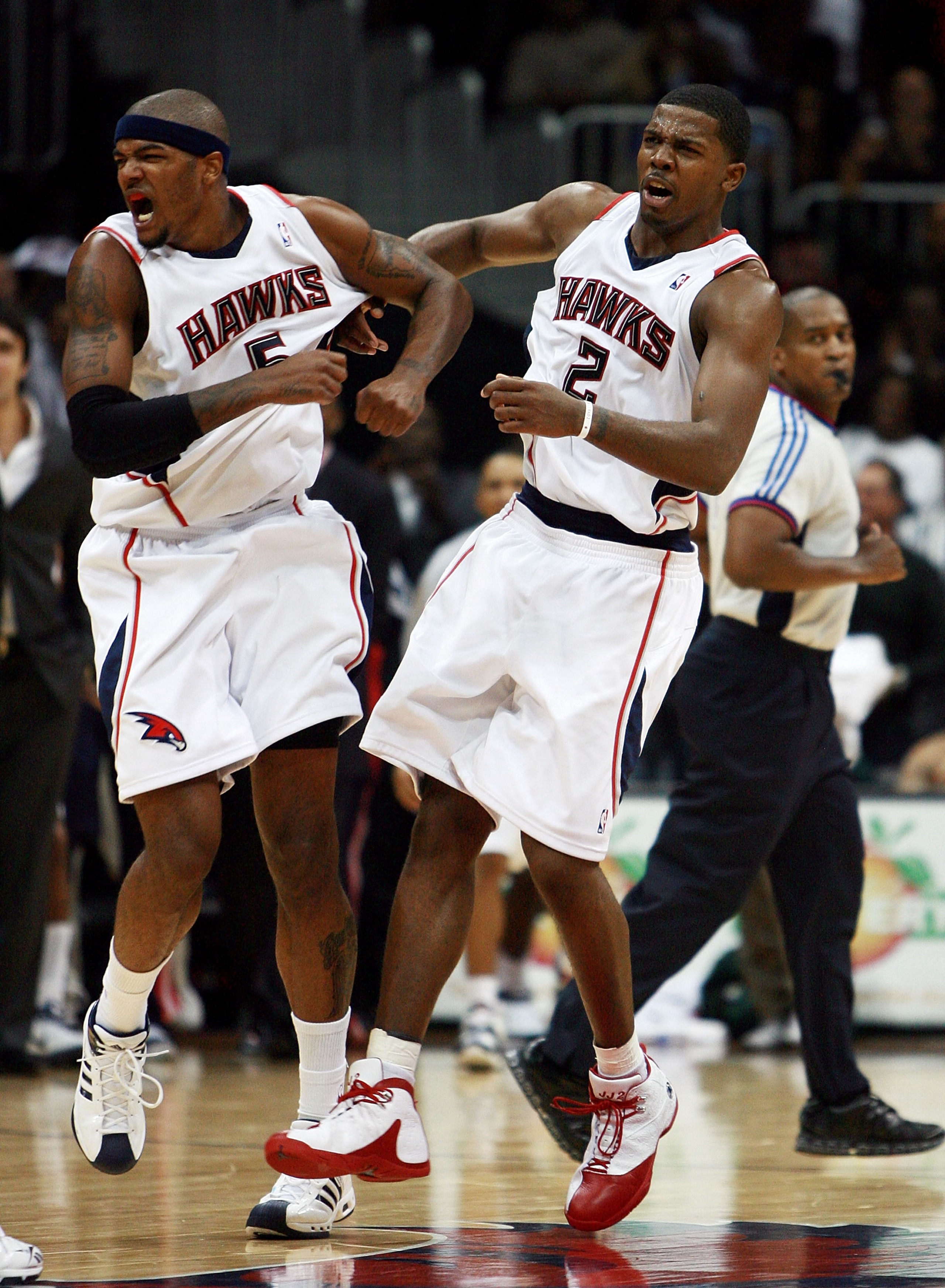 ATLANTA - NOVEMBER 02:  Joe Johnson #2 and Josh Smith #5 of the Atlanta Hawks celebrate after a big shot late in the game against the Dallas Mavericks at Philips Arena on November 2,  2007 in Atlanta, Georgia. The Hawks defeated the Mavericks 101-94. NOTE