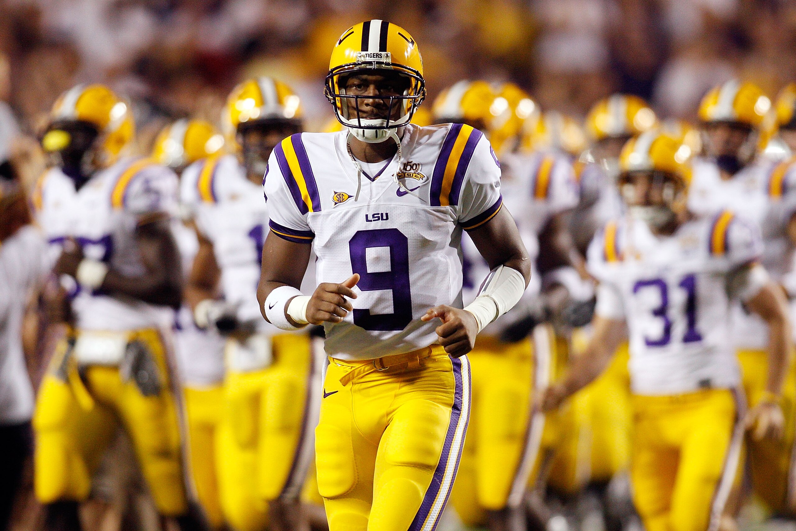 BATON ROUGE, LA - SEPTEMBER 25: Jordan Jefferson #9 of the Louisiana State Univeristy Tigers runs on the field before playing the West Virginia Mountaineers at Tiger Stadium on September 25, 2010 in Baton Rouge, Louisiana. (Photo by Chris Graythen/Getty BATON ROUGE, LA - SEPTEMBER 25: Jordan Jefferson #9 of the Louisiana State Univeristy Tigers runs on the field before playing the West Virginia Mountaineers at Tiger Stadium on September 25, 2010 in Baton Rouge, Louisiana. (Photo by Chris Graythen/Getty