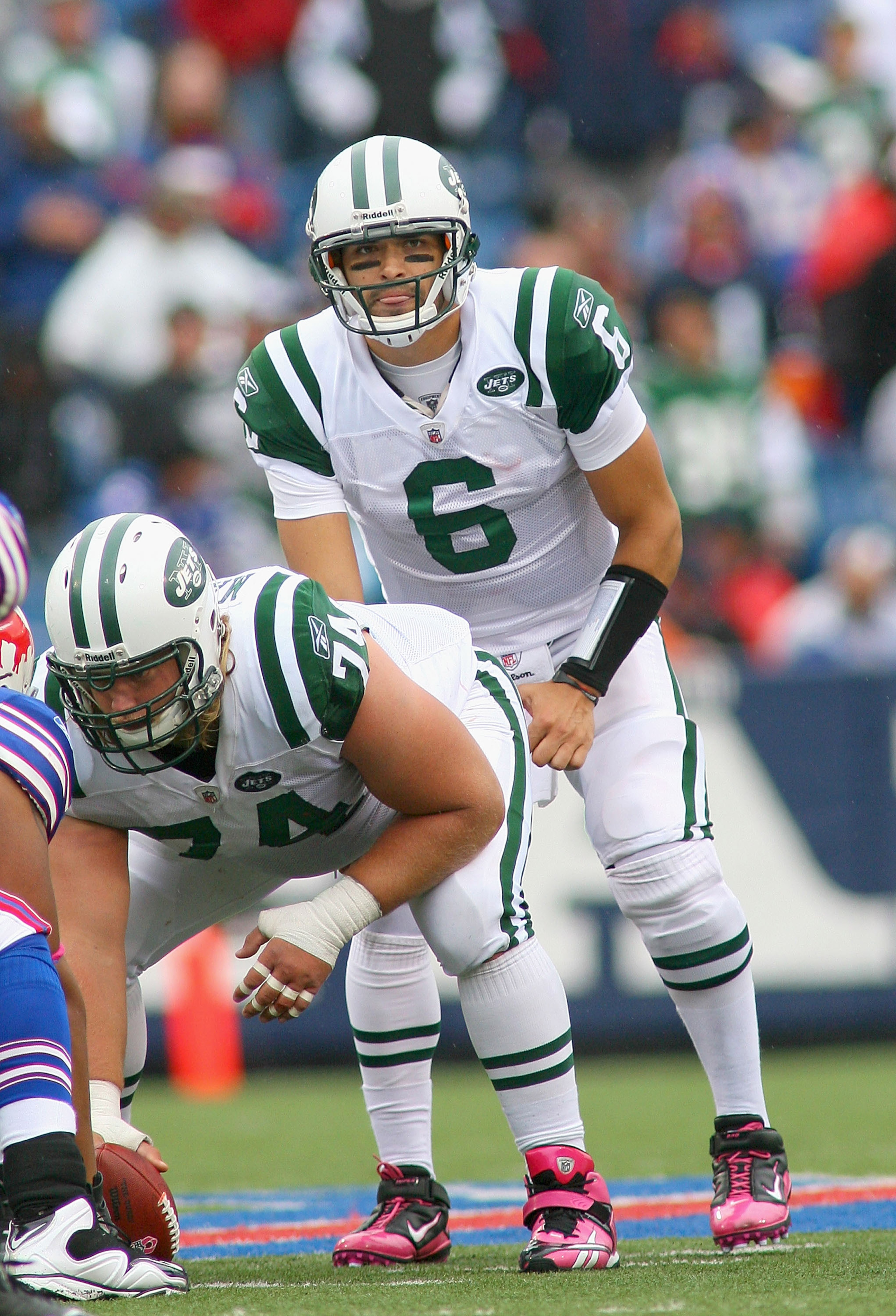 ORCHARD PARK, NY - OCTOBER 03: Mark Sanchez #6 of the New York Jets lines up behind center Nick Mangold #74 against the Buffalo Bills at Ralph Wilson Stadium on October 3, 2010 in Orchard Park, New York. The Jets won 38-14. (Photo by Rick Stewart/Getty I ORCHARD PARK, NY - OCTOBER 03: Mark Sanchez #6 of the New York Jets lines up behind center Nick Mangold #74 against the Buffalo Bills at Ralph Wilson Stadium on October 3, 2010 in Orchard Park, New York. The Jets won 38-14. (Photo by Rick Stewart/Getty I