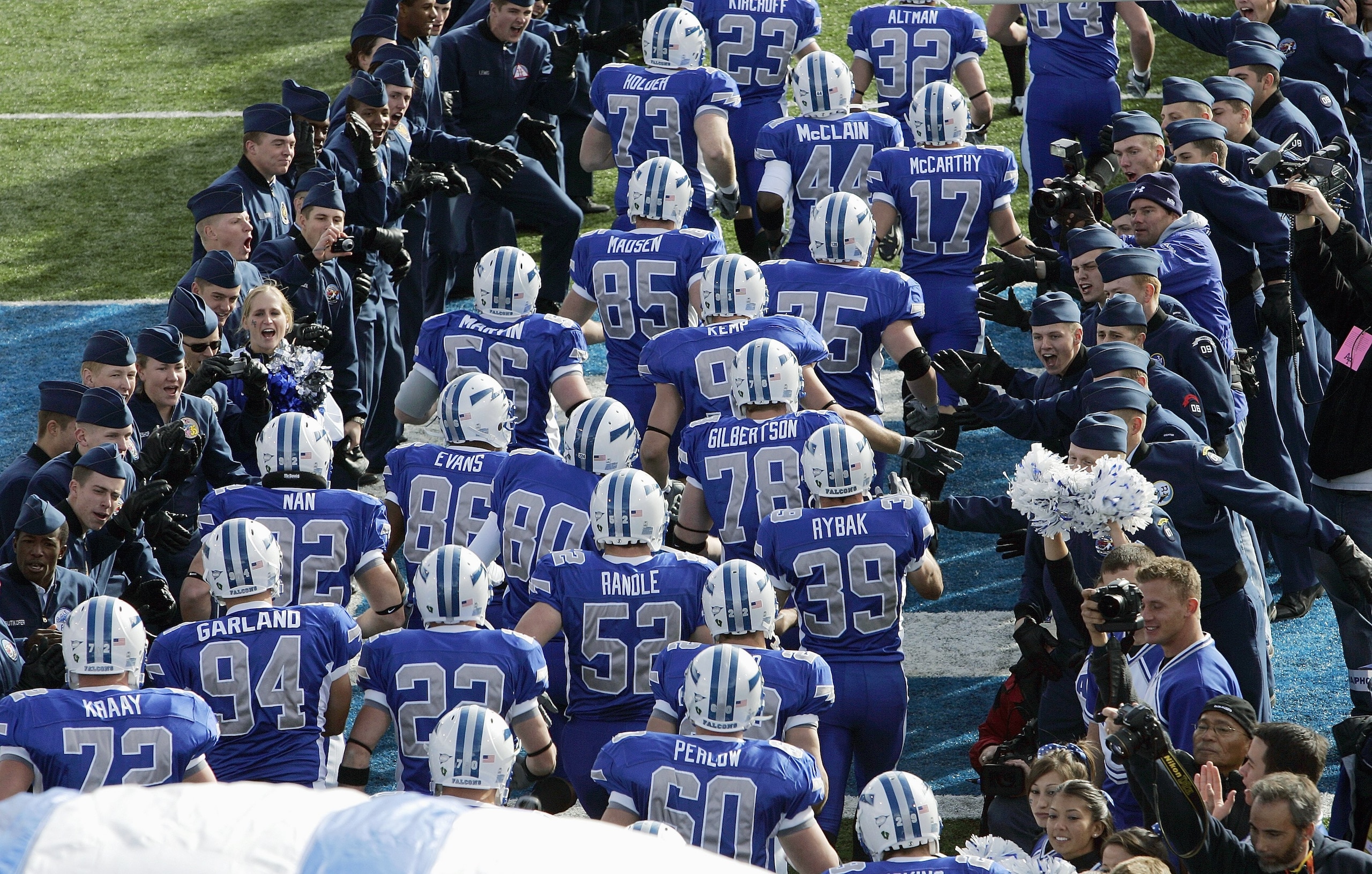 AIR FORCE ACADEMY, CO - NOVEMBER 11: The Air Force Falcons runs onto the field before the game against the Notre Dame Fighting Irish on November 11, 2006 at Falcon Stadium on the Air Force Academy near Colorado Springs, Colorado.  (Photo by Brian Bahr/Get
