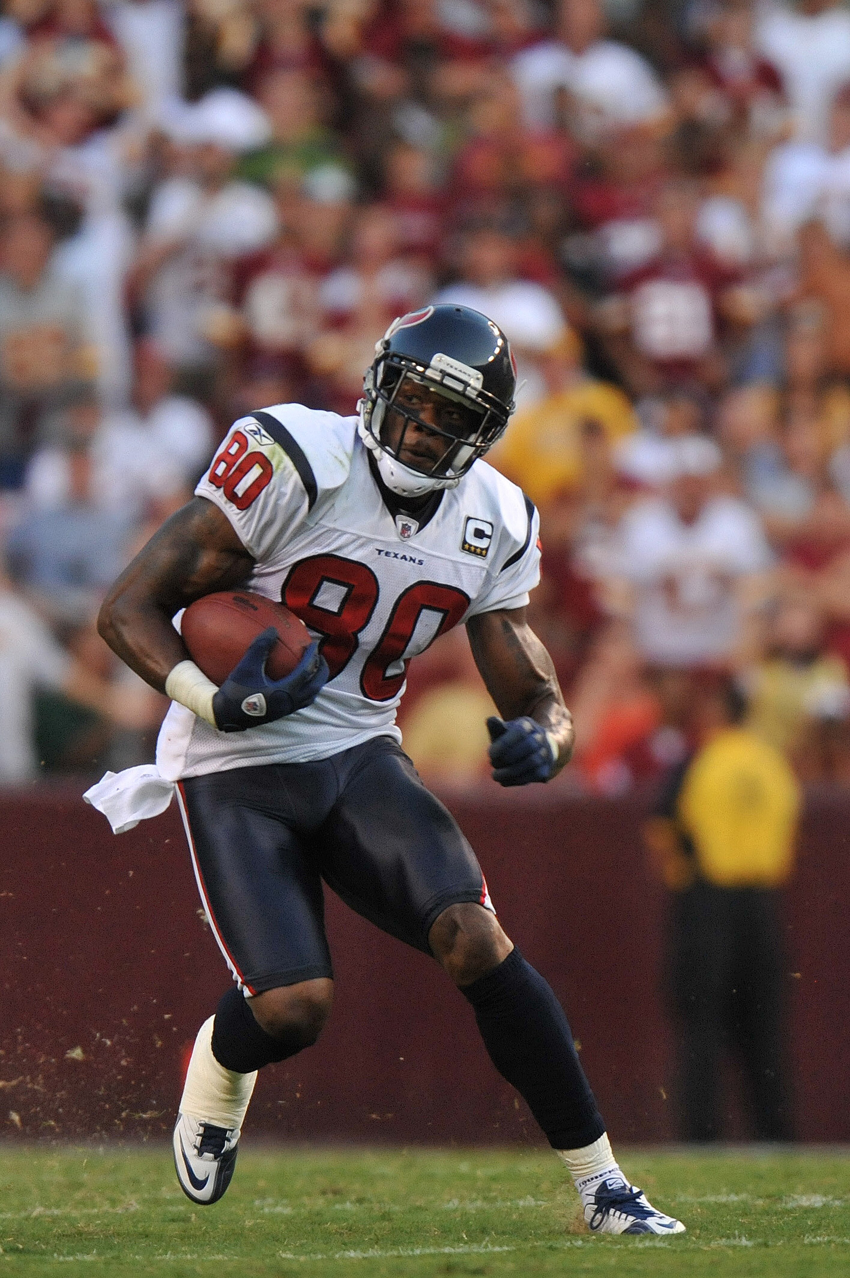 LANDOVER - SEPTEMBER 19:  Andre Johnson #80 of the Houston Texans runs the ball against the Washington Redskins at FedExField on September 19, 2010 in Landover, Maryland. The Texans defeated the Redskins in overtime 30-27. (Photo by Larry French/Getty Ima