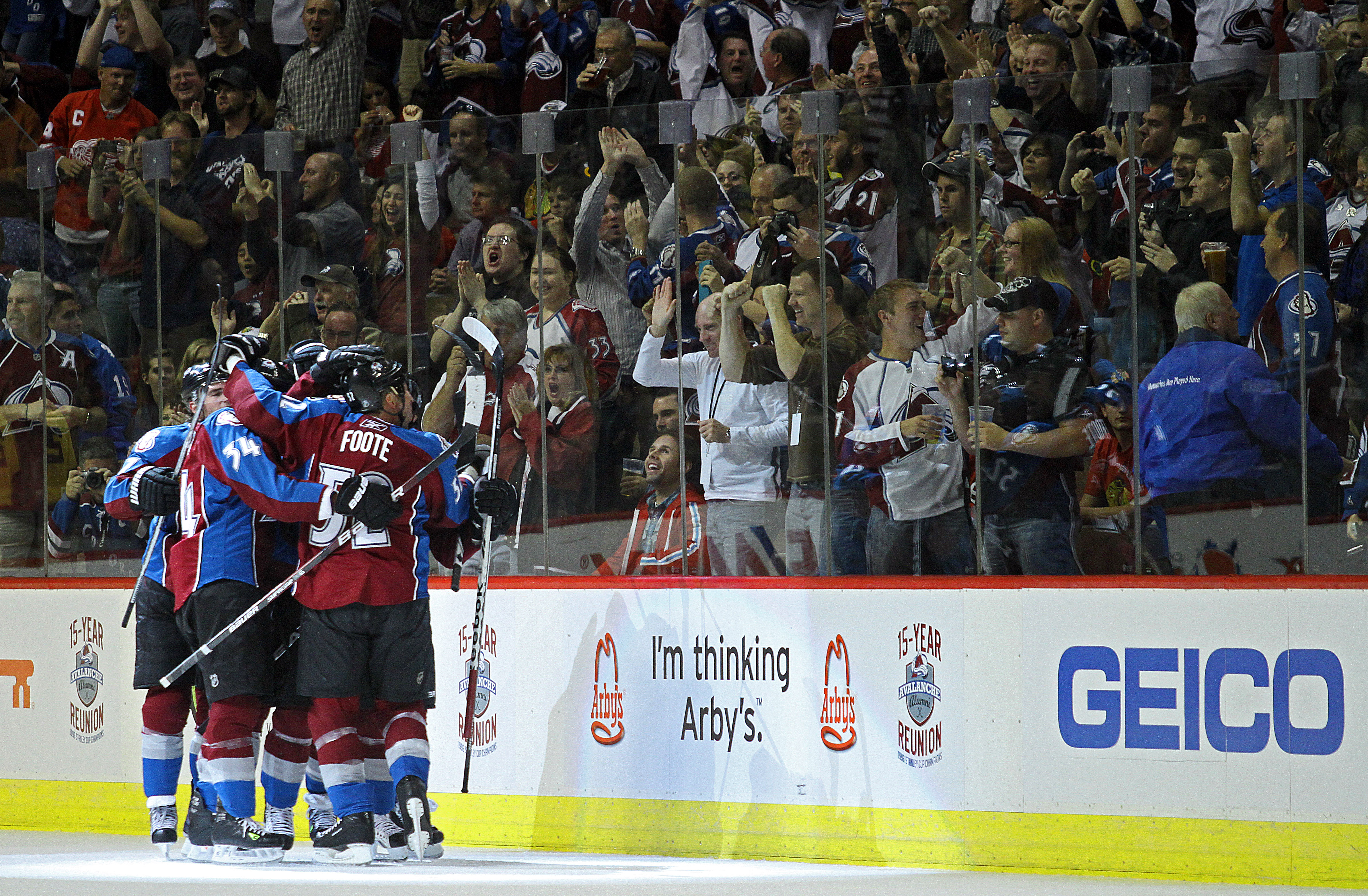 DENVER, CO - OCTOBER 7:  Colorado Avalanche players celebrate a goal by teammate Matt Duchene against the Chicago Blackhawks during both team's season openers at the Pepsi Center on October 7, 2010 in Denver, Colorado. (Photo by Marc Piscotty/Getty Images