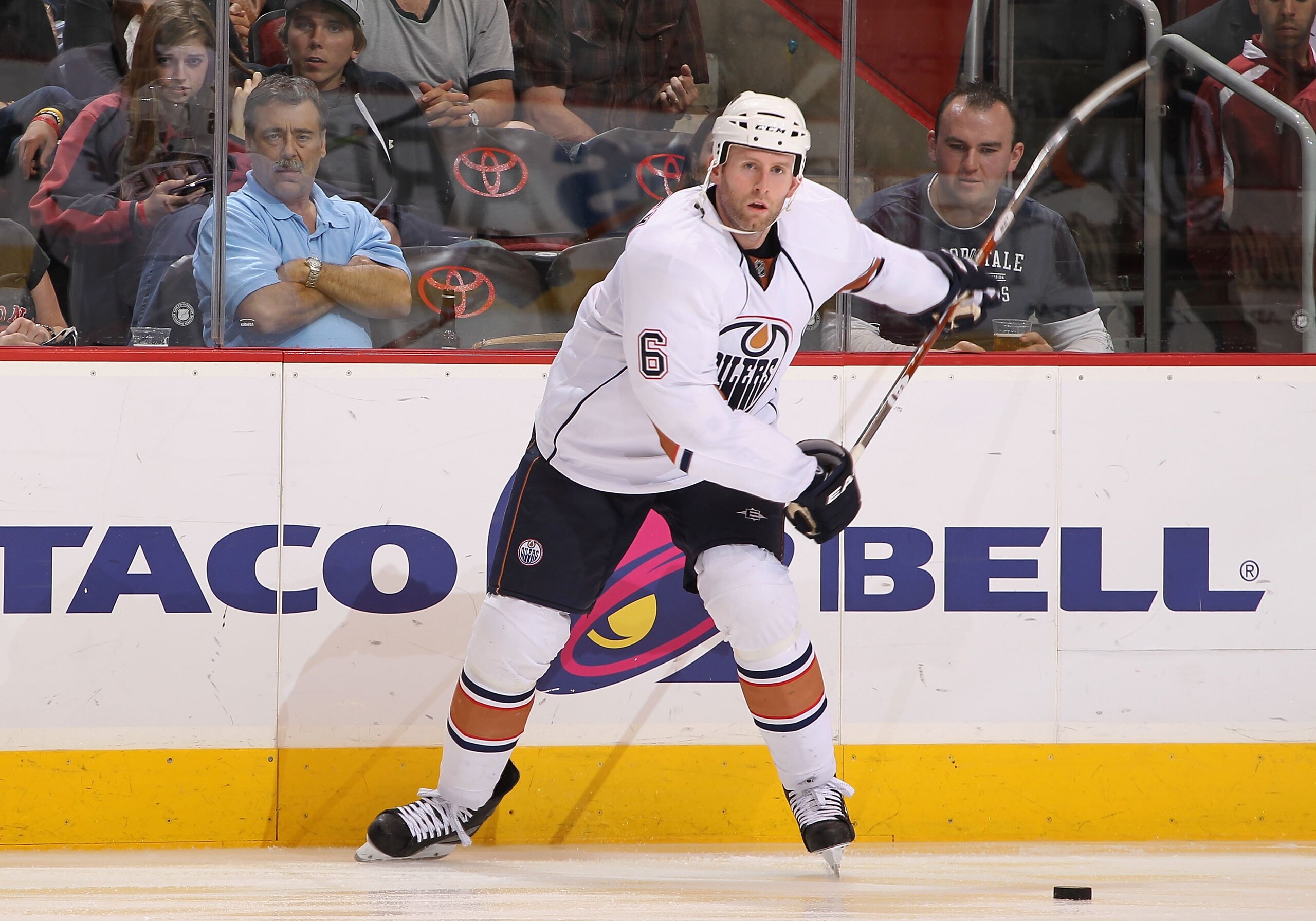GLENDALE, AZ - APRIL 03:  Ryan Whitney #3 of the Edmonton Oilers shoots the puck during the NHL game against the Phoenix Coyotes at Jobing.com Arena on April 3, 2010 in Glendale, Arizona.  The Coyotes defeated the Oilers 3-2 in an overtime shootout.  (Pho