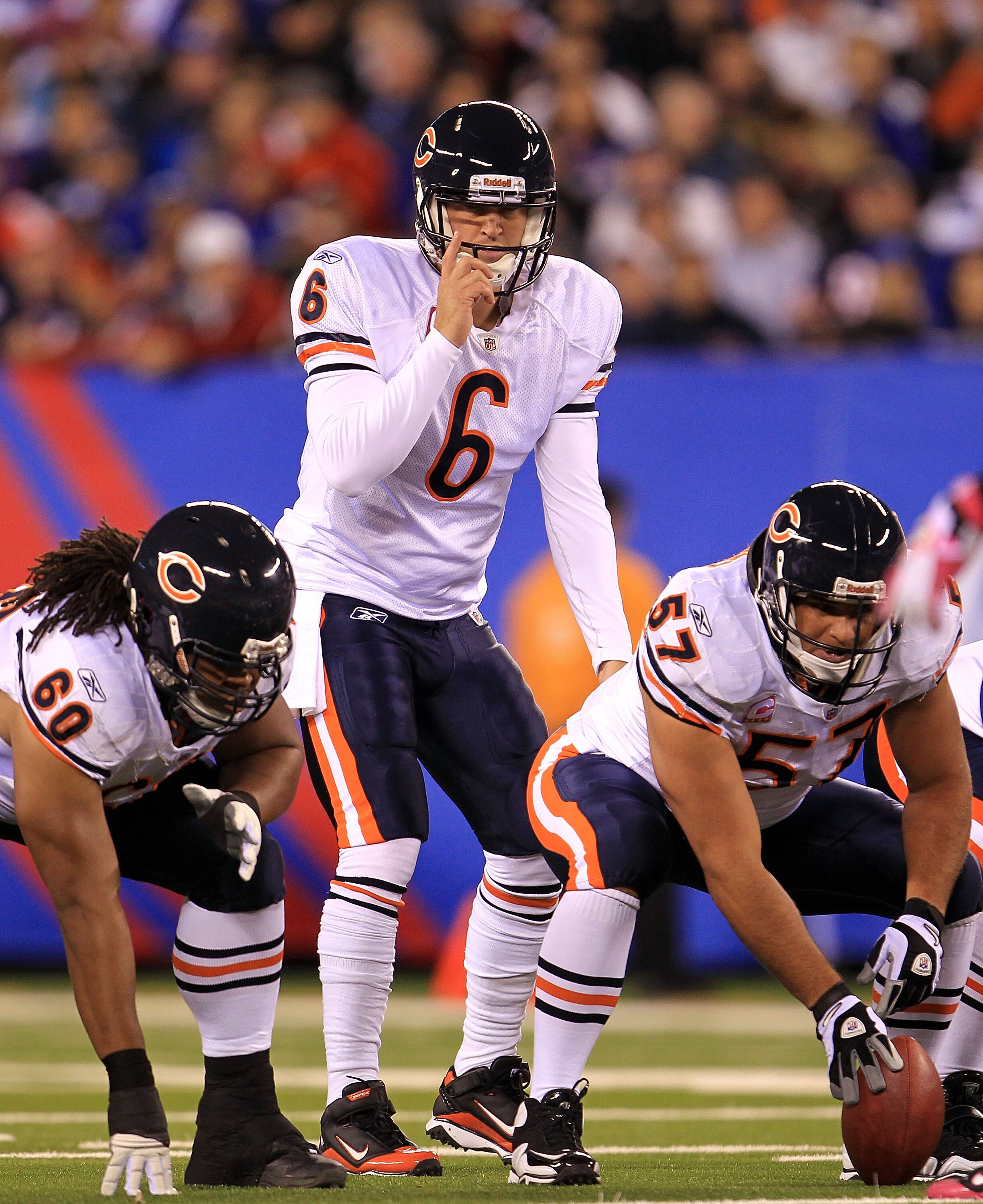 EAST RUTHERFORD, NJ - OCTOBER 03:  Jay Cutler #6 of the Chicago Bears waits for the snap from Olin Kreutz #57 against the New York Giants at New Meadowlands Stadium on October 3, 2010 in East Rutherford, New Jersey.  (Photo by Chris McGrath/Getty Images)