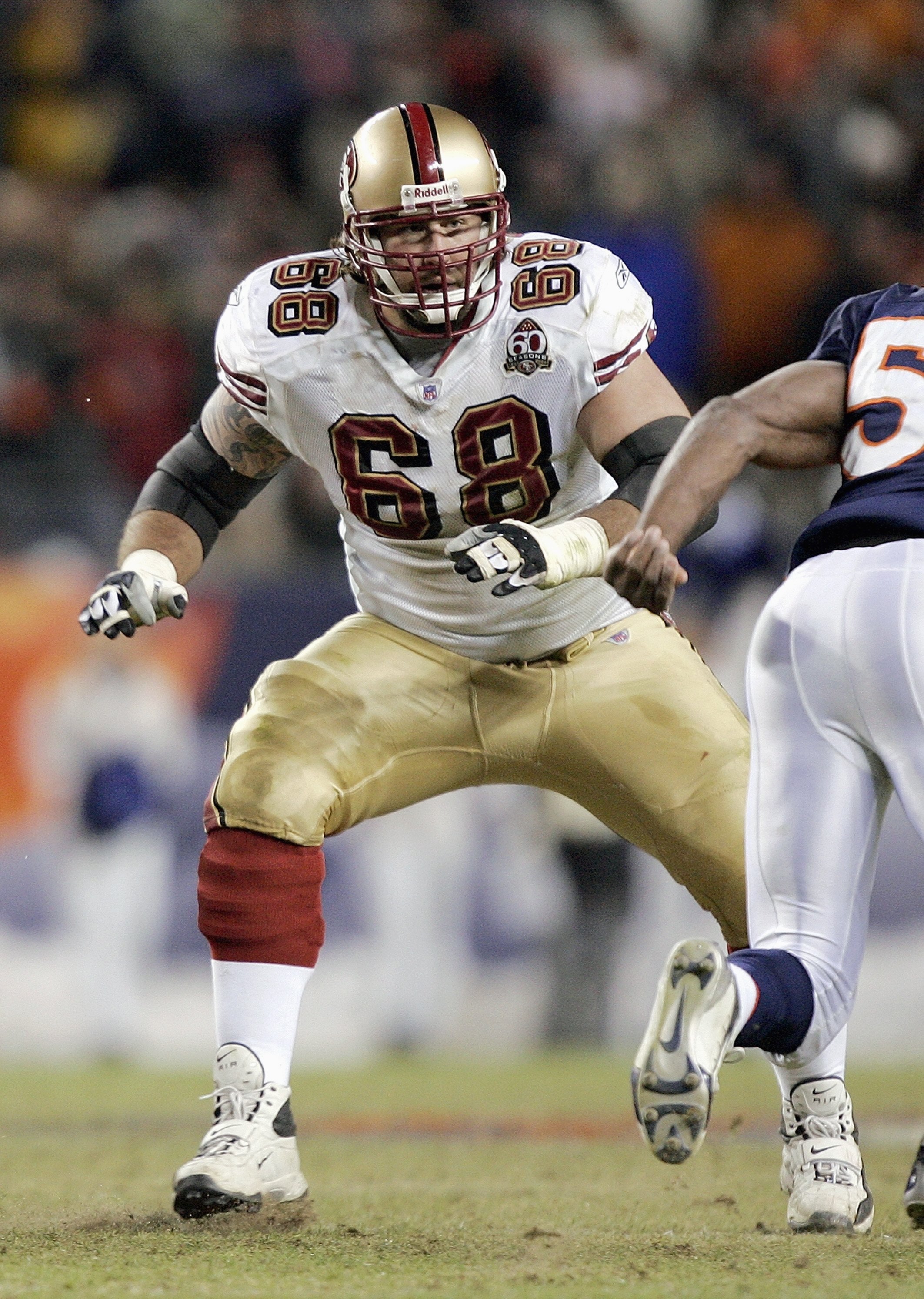 DENVER - DECEMBER 31: Adam Snyder #68 of the San Francisco 49ers moves on the field during the game against the Denver Broncos at Invesco Field at Mile High on December 31, 2006 in Denver, Colorado. The 49ers won 26-23, eliminating the Broncos from the pl