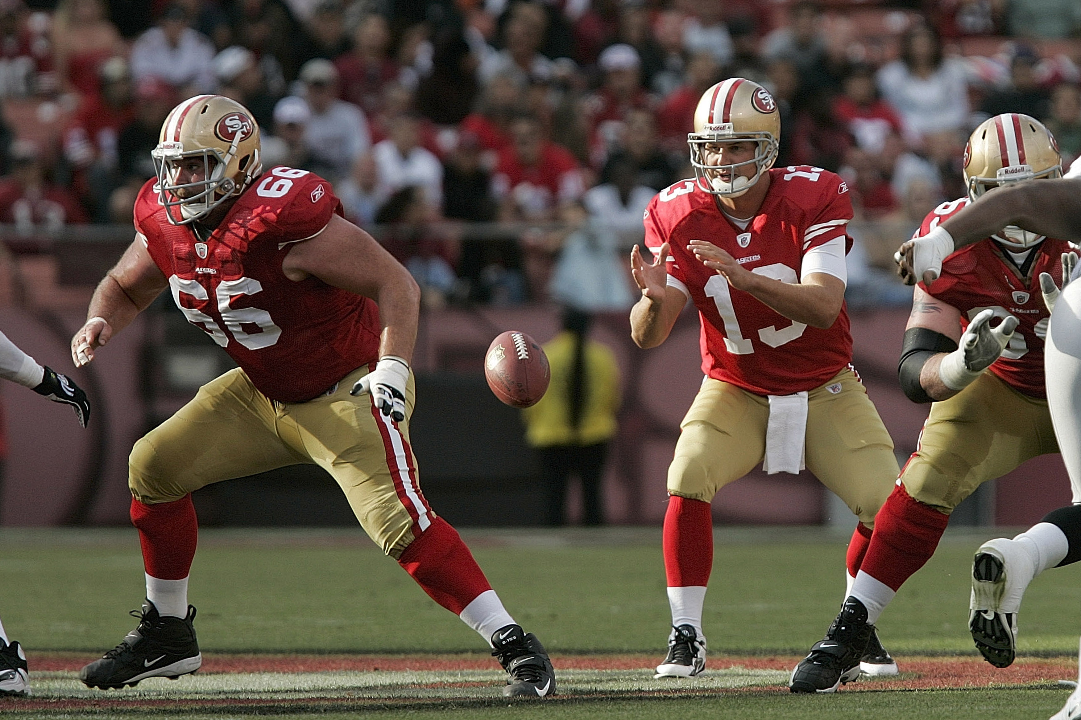 SAN FRANCISCO - AUGUST 22:  San Francisco 49ers quarterback Shaun Hill #13 receives a snap from San Francisco 49ers center Eric Heitmann #66 during 1st quarter action as the San Francisco 49ers host the Oakland Raiders at Candlestick Park August 22, 2009