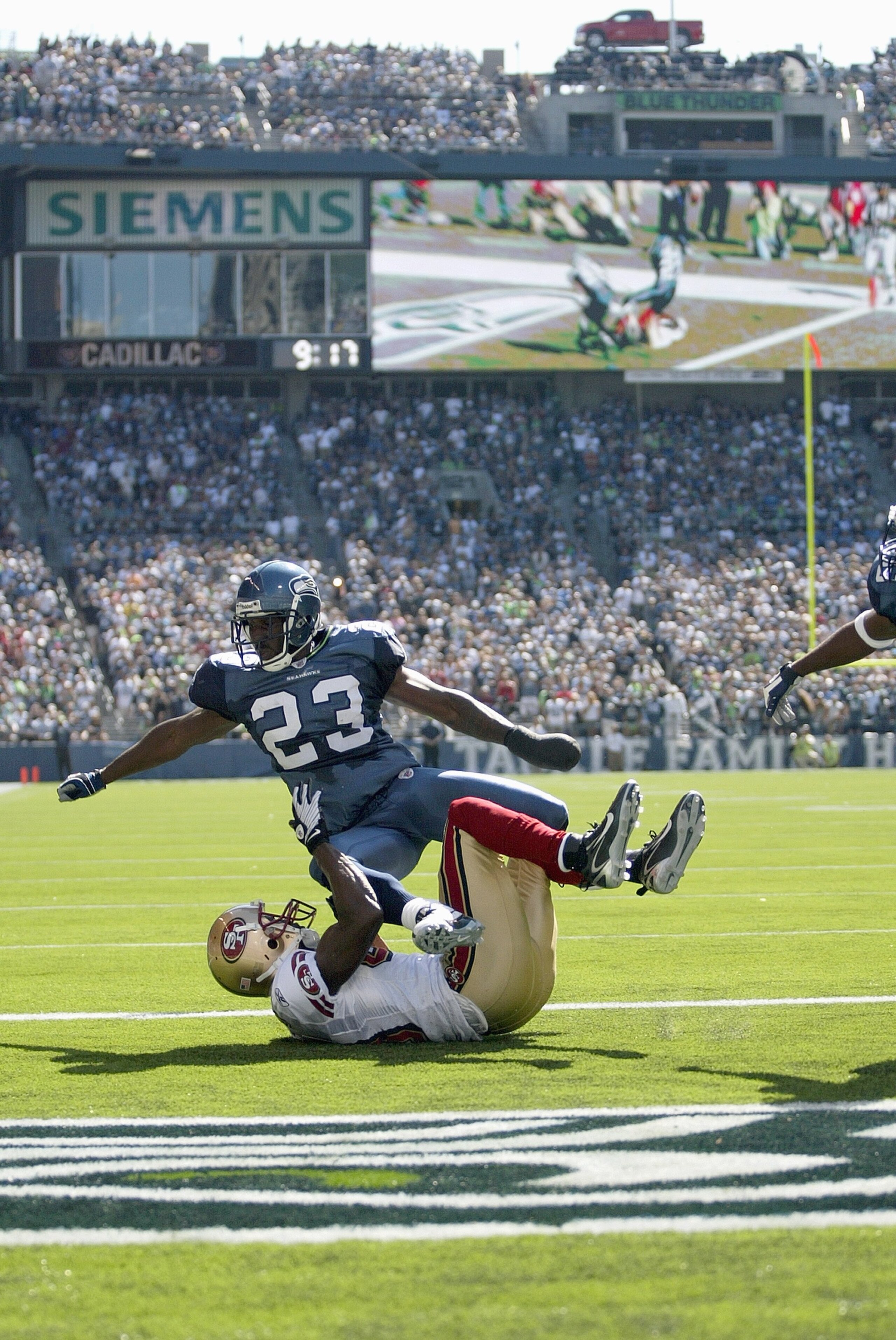 SEATTLE - SEPTEMBER 14:  Marcus Trufant #23 of the Seattle Seahawks covers the endzone during the game against the San Francisco 49ers on September 14, 2008 at Qwest Field in Seattle Washington. (Photo by Otto Greule Jr/Getty Images)