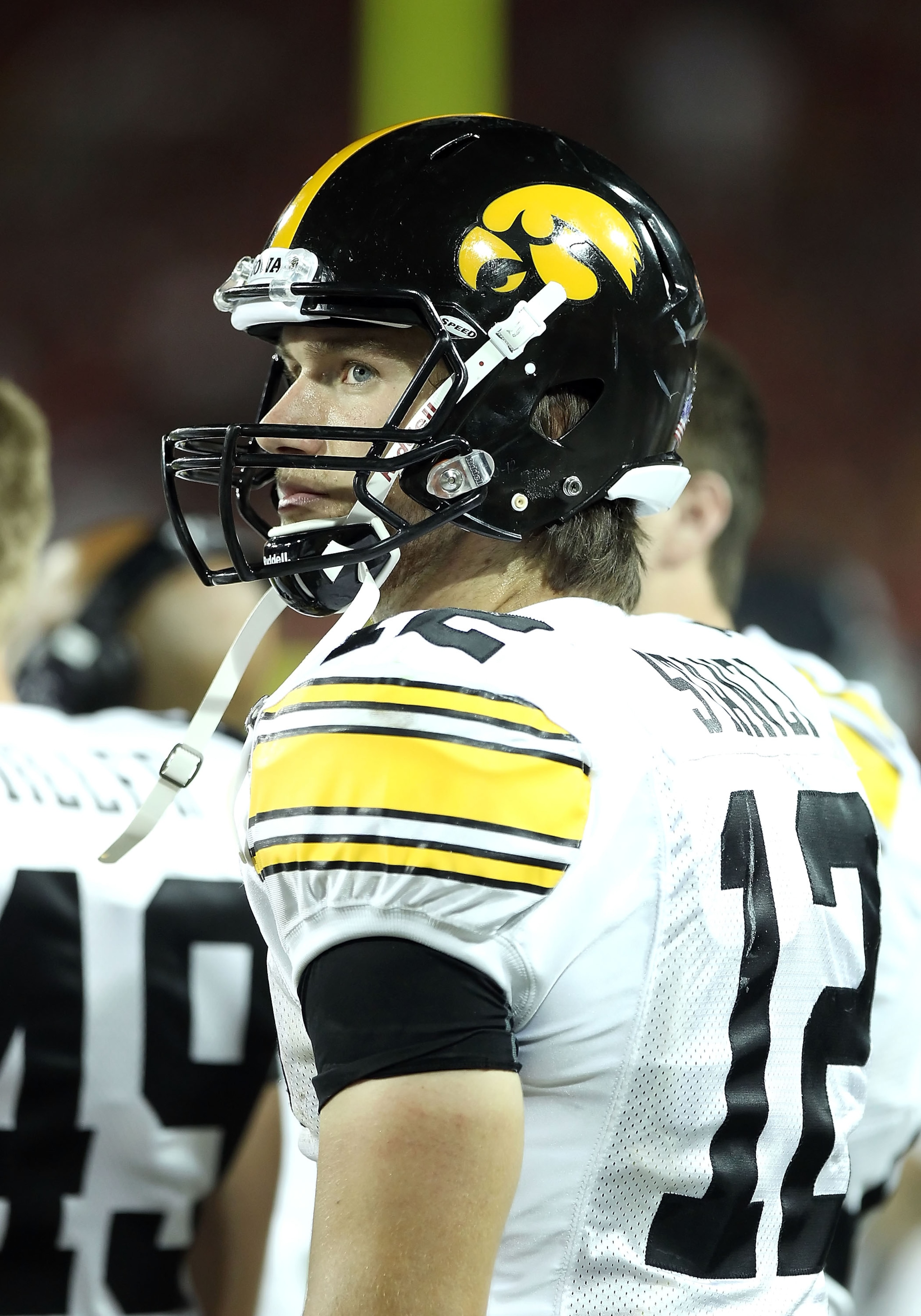 TUCSON, AZ - SEPTEMBER 18:  Quarterback Ricky Stanzi #12 of the Iowa Hawkeyes watches from the sidelines during the college football game against the Arizona Wildcats at Arizona Stadium on September 18, 2010 in Tucson, Arizona.  The Wildcats defeated the