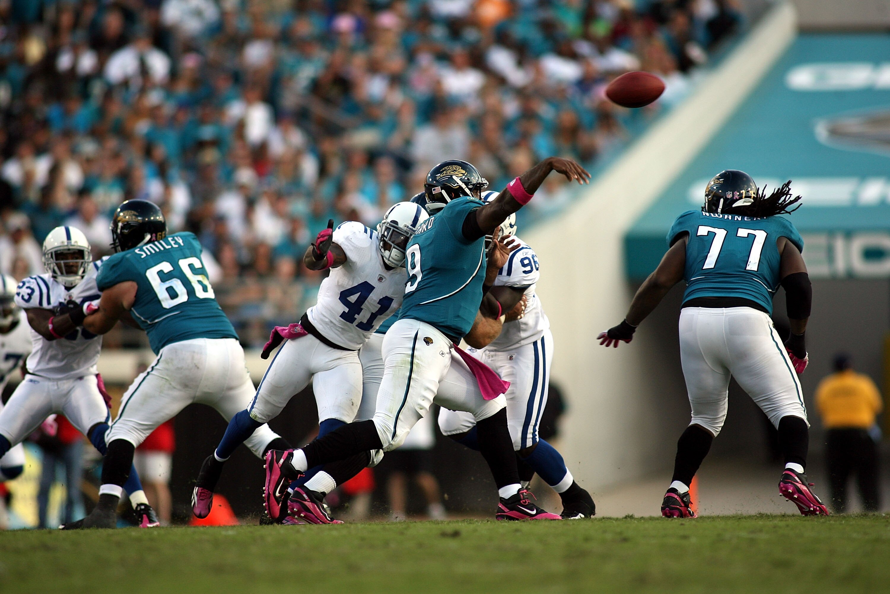 JACKSONVILLE, FL - OCTOBER 03:  Quarterback David Garrard #9 of the Jacksonville Jaguars rolls out against the Indianapolis Colts at EverBank Field on October 3, 2010 in Jacksonville, Florida. The Jaguars won 31-28.  (Photo by Marc Serota/Getty Images)