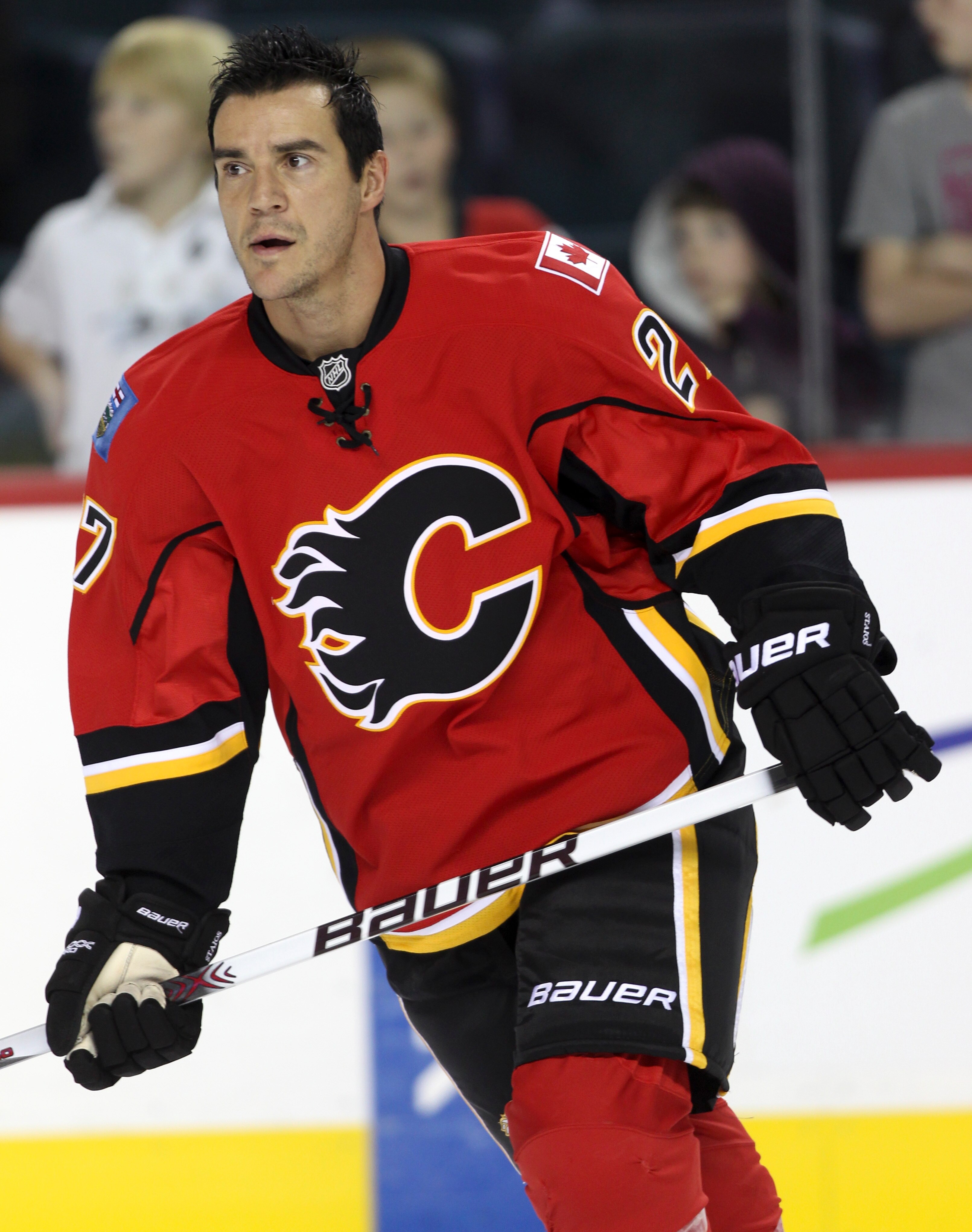 CALGARY, AB - SEPTEMBER 28:  Steve Staios #27 of the Calgary Flames warms up before a preseason game against the Phoenix Coyotes on September 28, 2010 at the Pengrowth Saddledome in Calgary, Alberta, Canada. (Photo by Mike Ridewood/Getty Images)